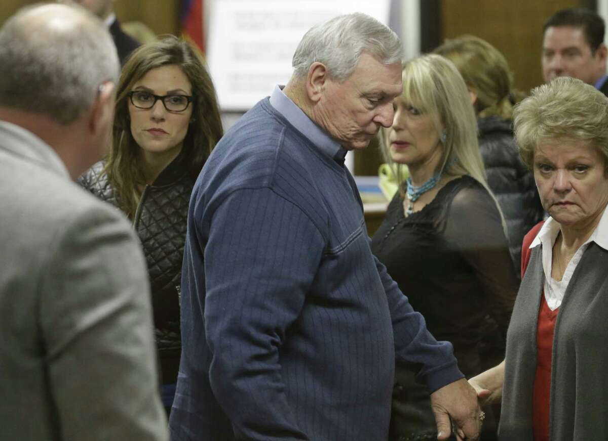 Former Navy SEAL Chris Kyle's widow, Taya, left, follows Don and Judy Littlefield, parents of Chad Littlefield, out of the courtroom after a break in the capital murder trial of Eddie Ray Routh on Friday ﻿in Stephenville. Routh is charged in the 2013 deaths of Kyle and Littlefield at a shooting range near Glen Rose.