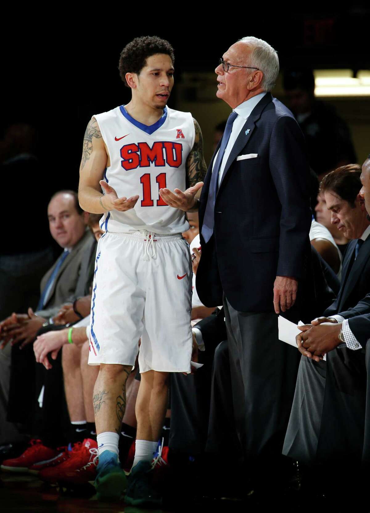 SMU point guard Nic Moore (11) and coach Larry Brown can breathe easier this season, as they're all but assured to earn a bid to the NCAA Tournament.