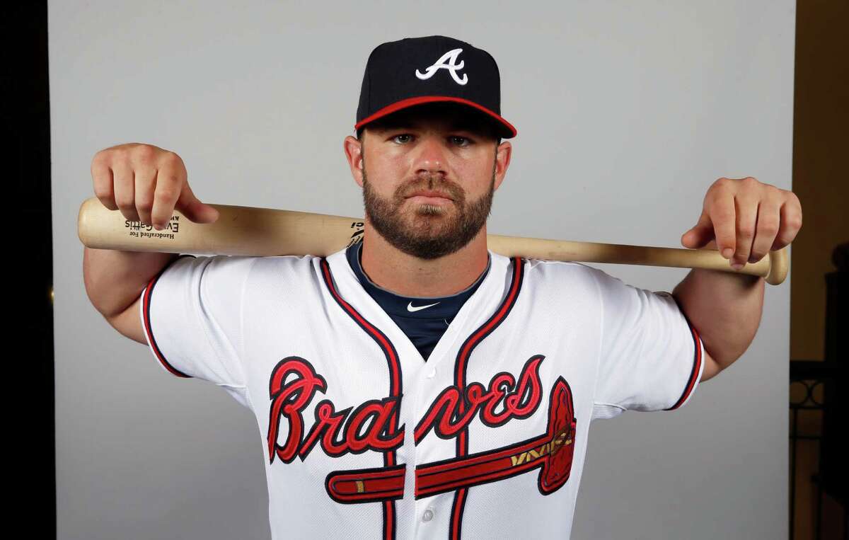 This is a 2014 photo of Evan Gattis of the Atlanta Braves baseball team. This image reflects the Braves active roster as of, Monday, Feb. 24, 2014, when this image was taken. (AP Photo/Alex Brandon)