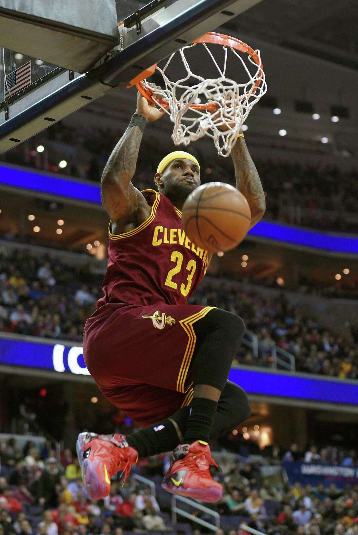 LeBron James jams one home during the Cavaliers' 38-point rout of the Wizards on Friday night. James poured in 28 points in 25 minutes of court time.