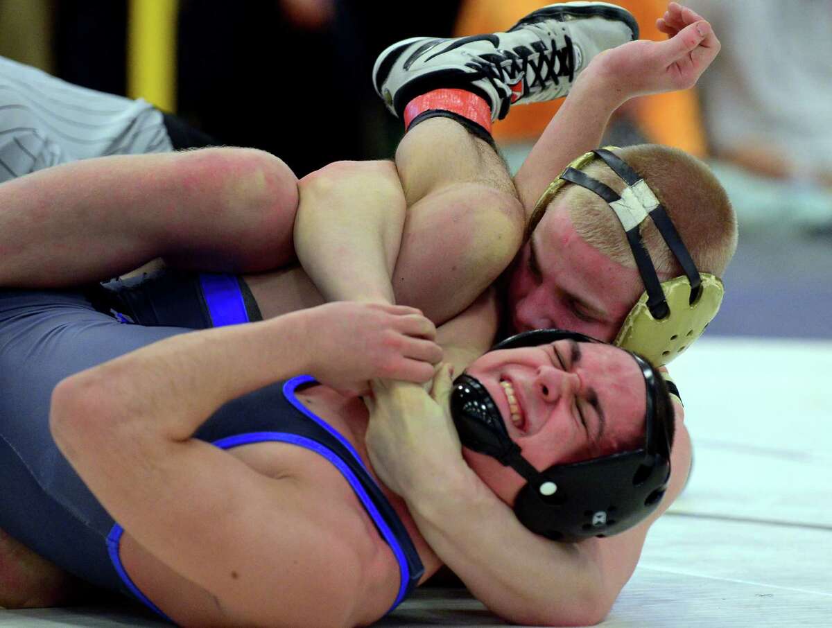 Newtown dominates at Class LL wrestling championships image