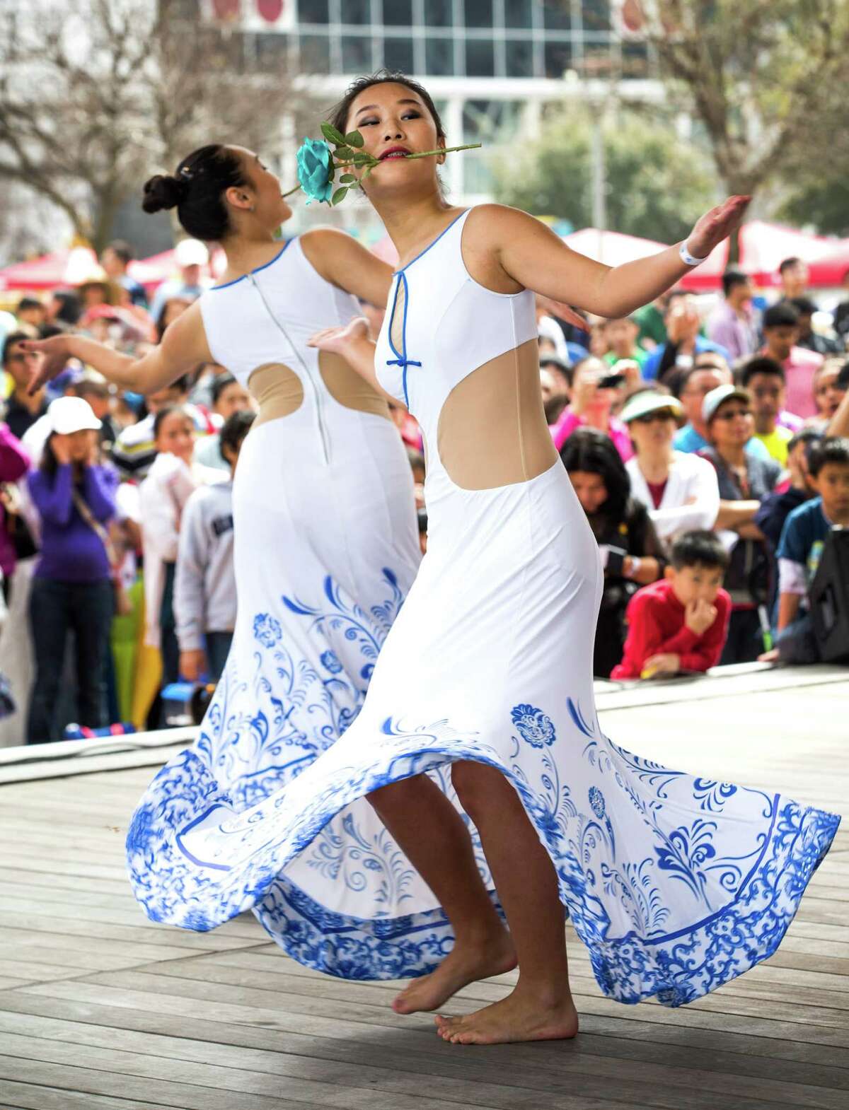 Dancers of the Flower dance troupe perform during the 19th Annual Texas Lunar New Year Celebration at Discovery Green on Saturday, Feb. 21, 2015, in Houston.