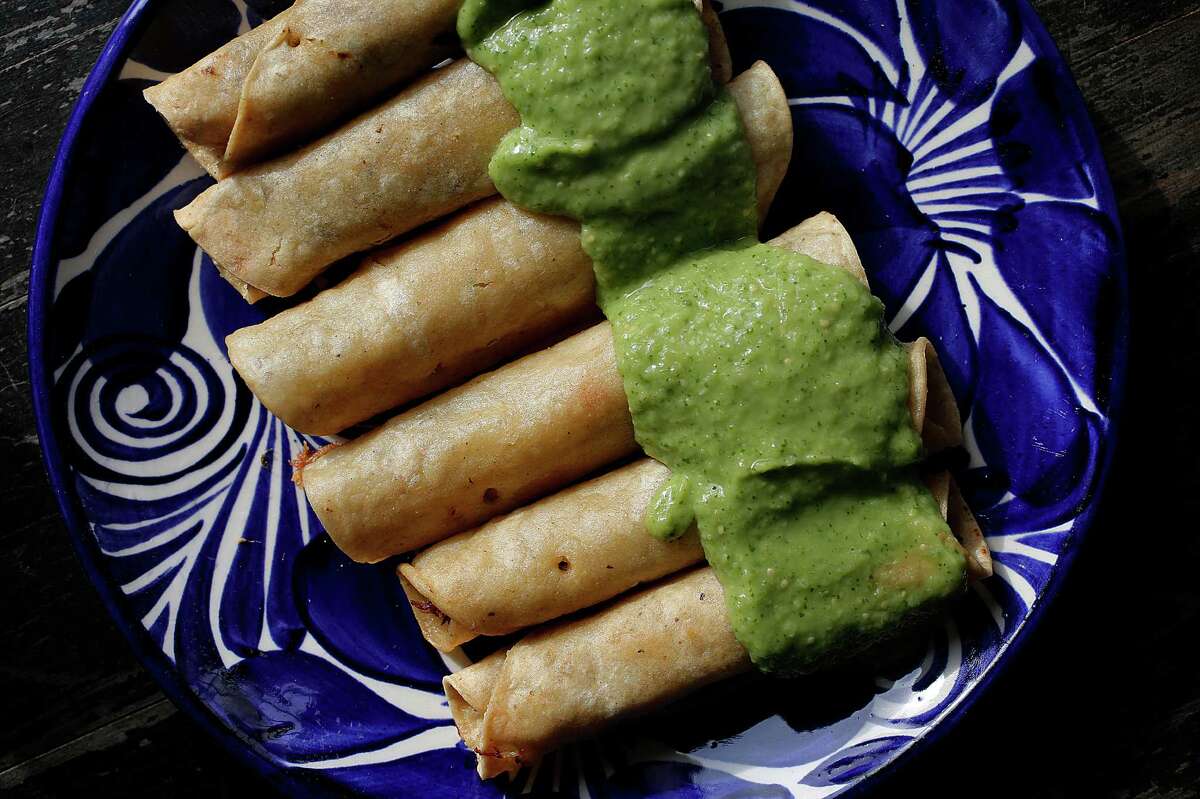 Crab taquitos with aioli and covered with avocado salsa by chefs Dona Savitsky and Thomas Schnetz of Doña Tomás restaurant.