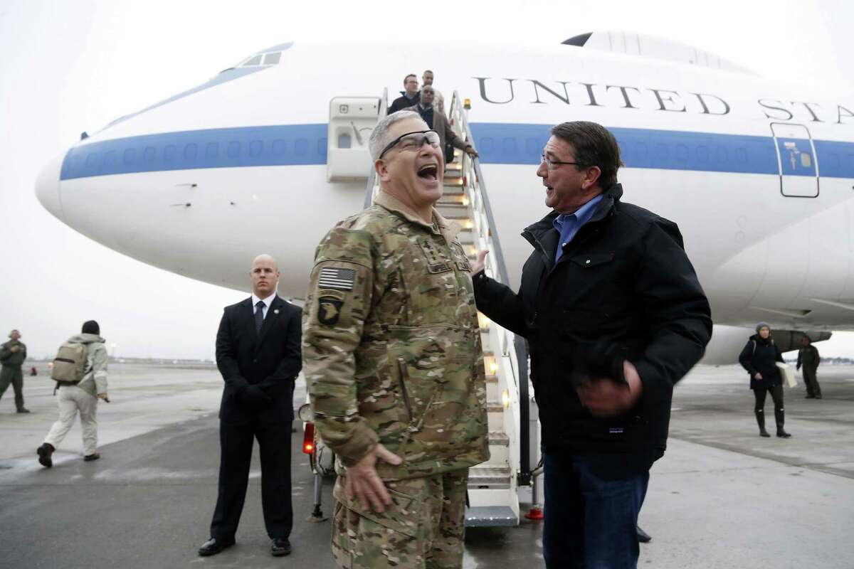 ﻿Defense Secretary Ashton Carter, right, elicits a laugh from ﻿Gen. John Campbell﻿ Saturday in Kabul, Afghanistan﻿, during Carter's first overseas trip as Pentagon chief.
