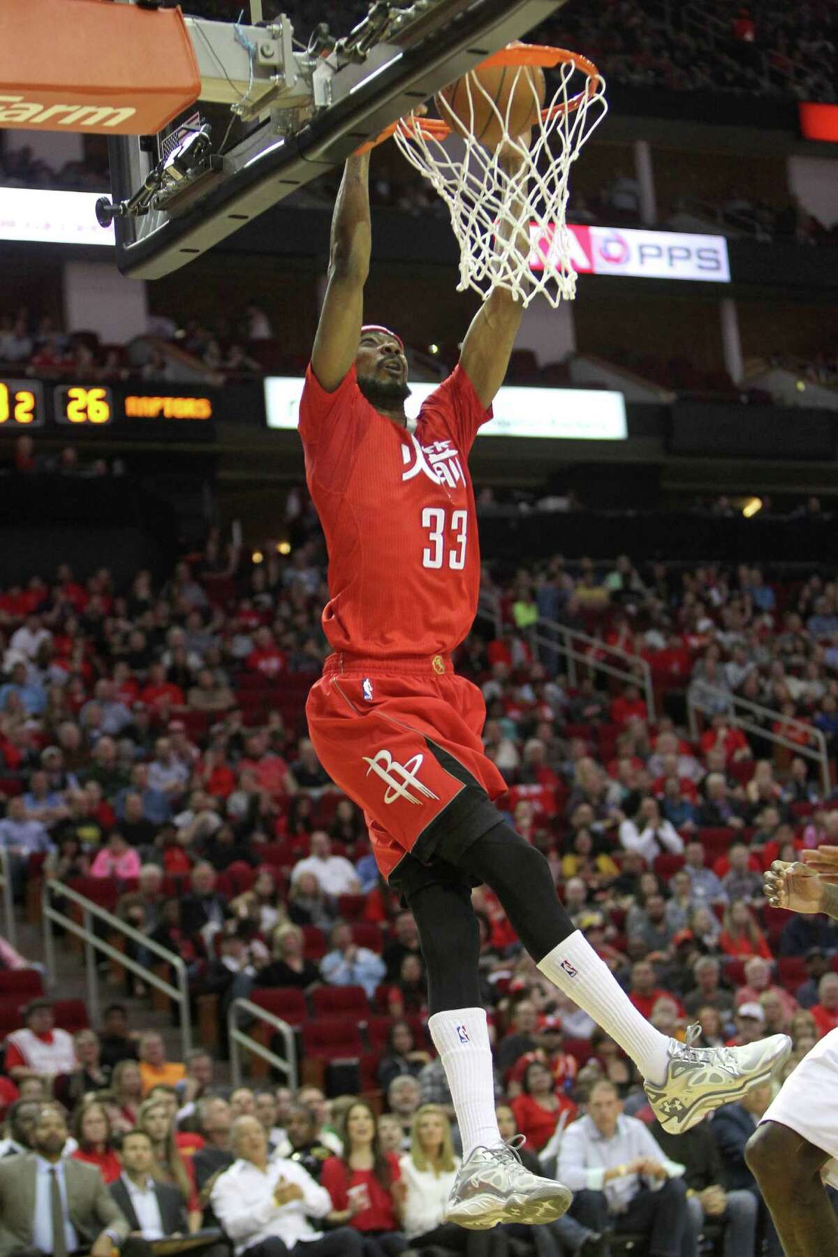 New Rockets Pablo Prigioni and KJ McDaniels watched as guard Corey Brewer, who came to Houston in a trade earlier this season, poured in 26 points to lead Houston past Toronto on Saturday night at Toyota Center.