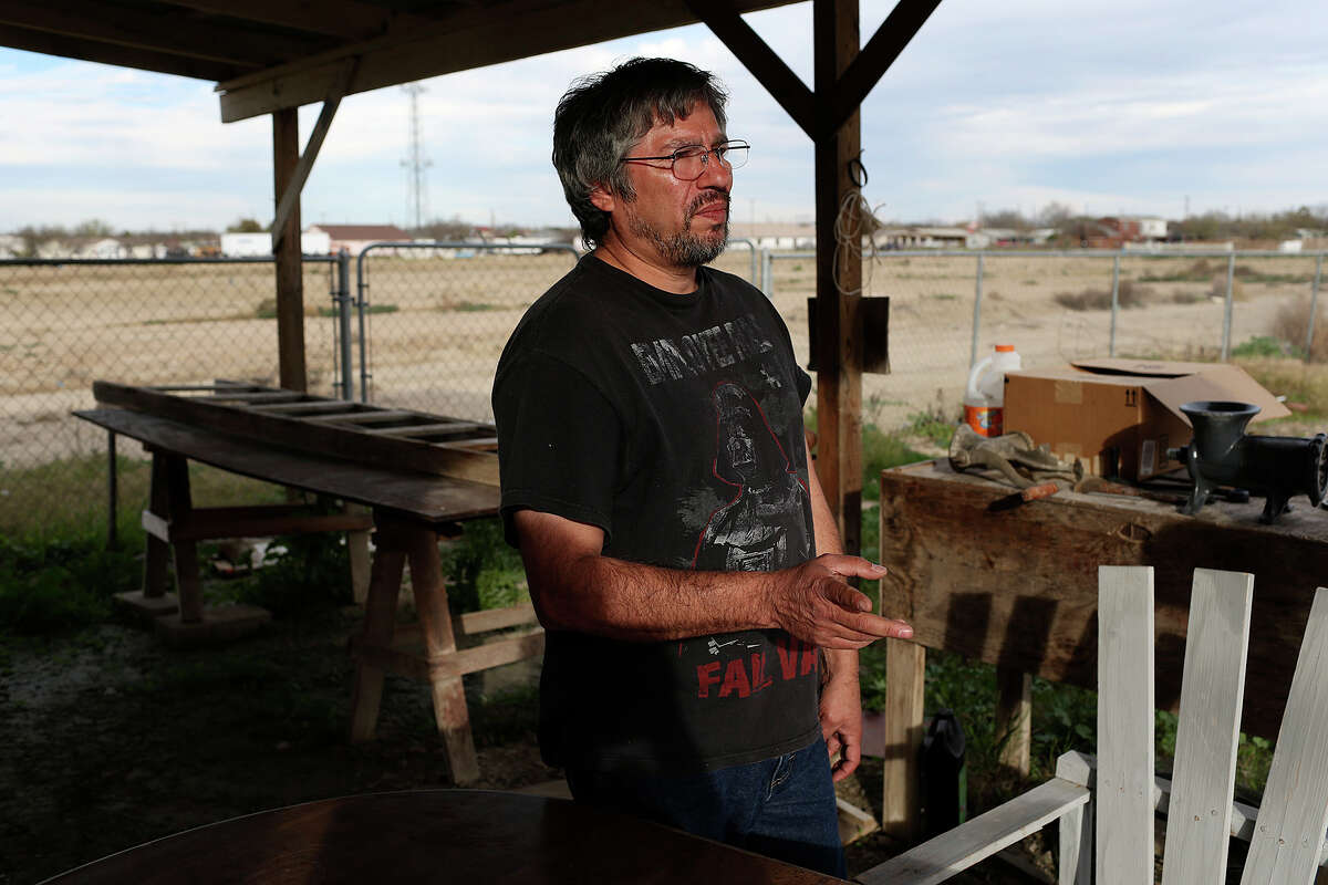 Pedro G. Martinez, 51, talks about life in the Las Quintas Fronterizas subdivision of Maverick County, Monday, Jan. 26, 2015. Behinds land is being developed for housing. Two years ago, FBI arrested three Maverick County Commissioners and a dozen other people, including county worker, on corruption and other charges. County commissioners and other public officials handed out $18 million in contracts as part of a Texas Department of Transportation grant to improve roadways and drainage in colonias, poor, unincorporated neighborhoods that suffer from a lack of services. On some occasions, commissioners handed out inflated contracts and the contractors kicked back a portion of the profits. Other times, contractors were paid in full without conducting any work.