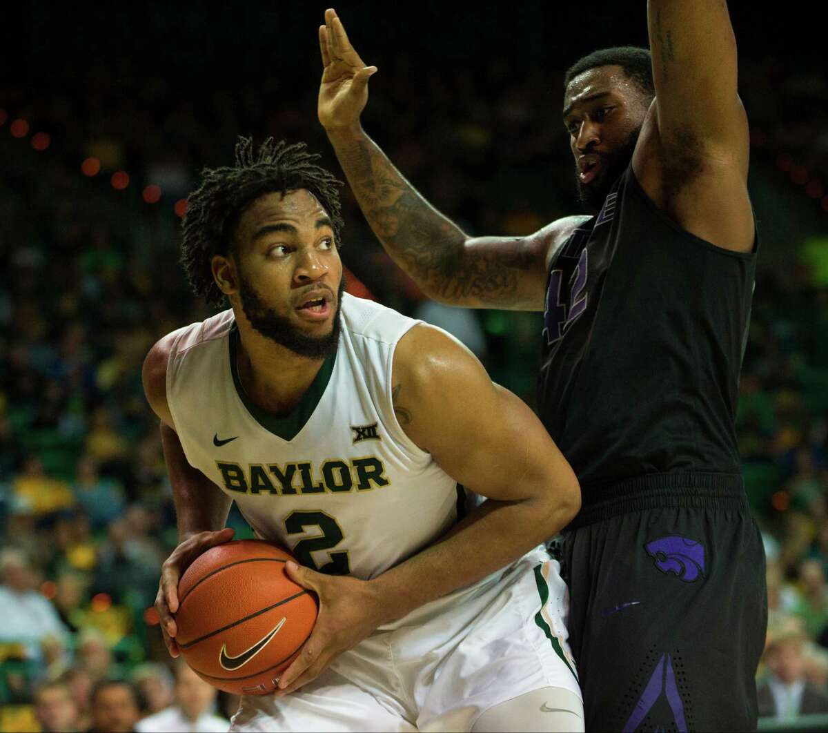 WACO, TX - FEBRUARY 21: Rico Gathers #2 of the Baylor Bears drives to the basket against Thomas Gipson #42 of the Kansas State Wildcats on February 21, 2015 at the Ferrell Center in Waco, Texas.