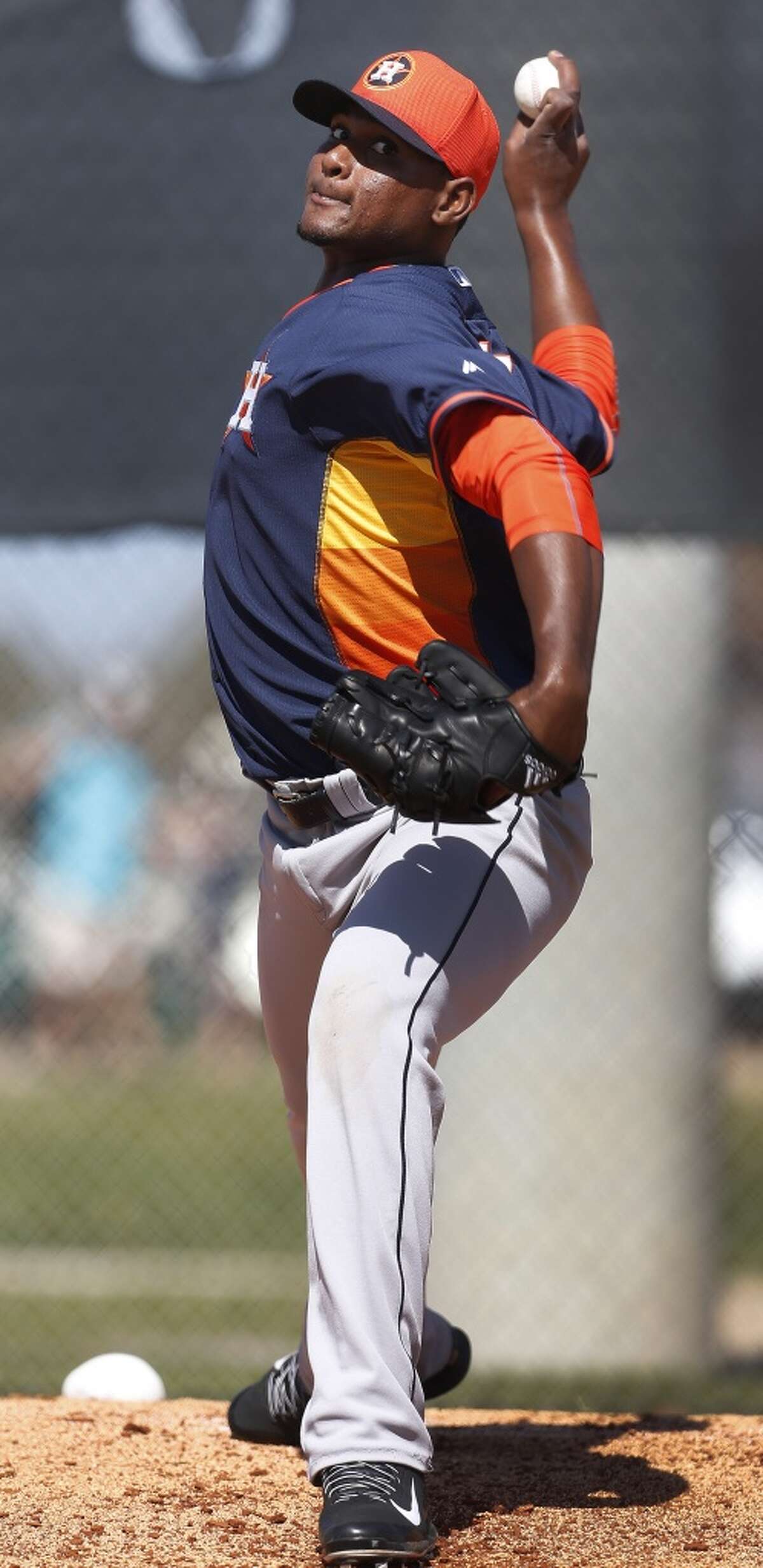Houston Astros starting pitcher Michael Feliz (68) pitches during spring training workouts for pitchers and catchers at their Osceola County training facility, Sunday, Feb. 22, 2015, in Kissimmee. ( Karen Warren / Houston Chronicle )