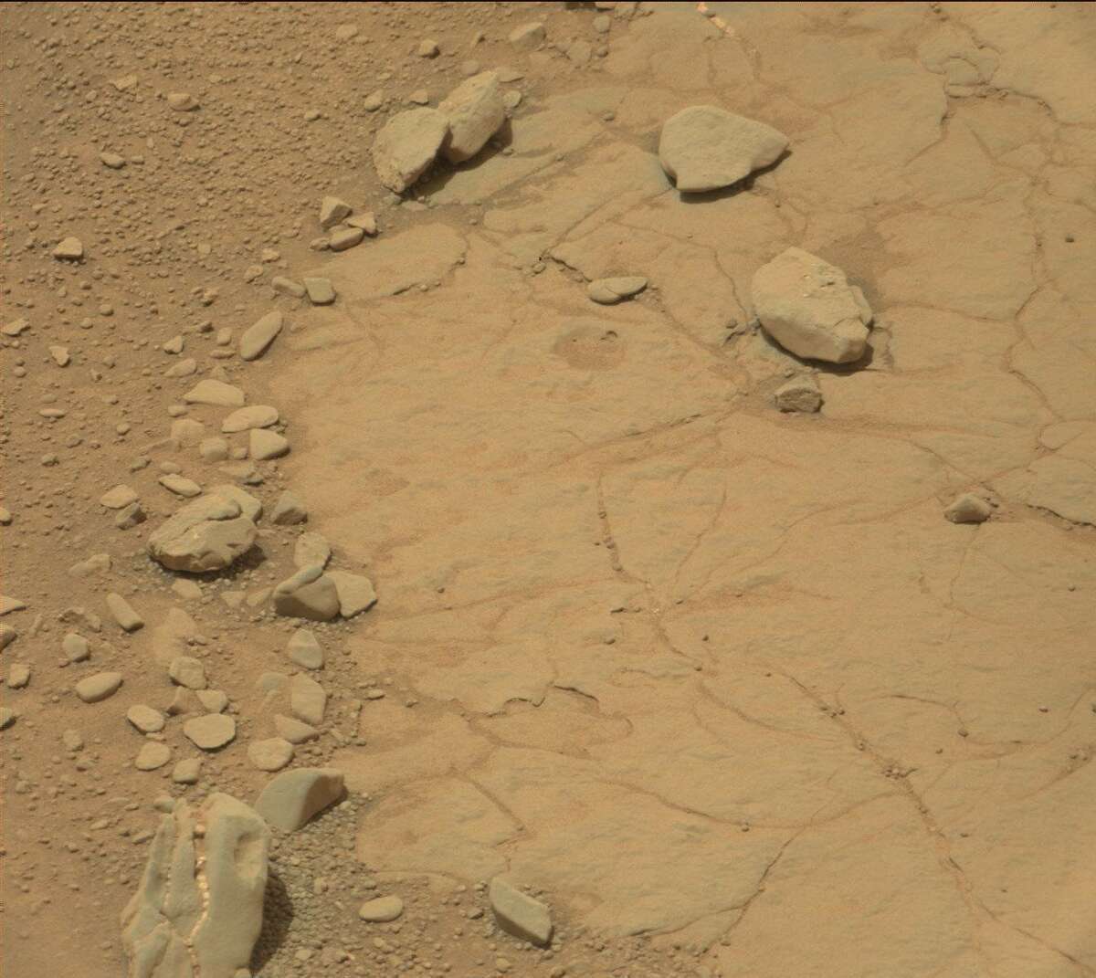 Dinosaur skull found on Mars? The Mars watchers at UFO Sightings Daily say this formation spotted in a NASA photo from Mars resembles a fossilized dinosaur head. We say it looks like a rock.Can you see it?