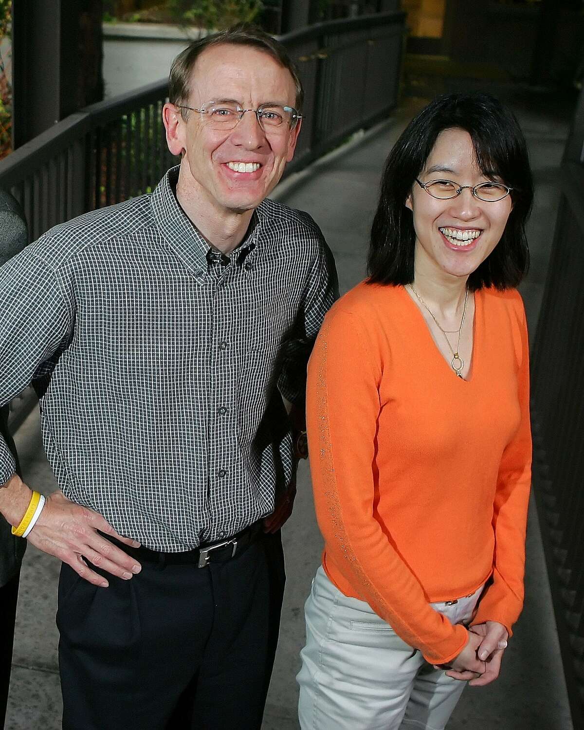 FILE - In this April 4, 2006 file photo, Kleiner Perkins Caulfield and Byers senior partner John Doerr poses for a portrait with partner Ellen Pao outside of their office in Menlo Park, Calif. A jury is set to hear opening arguments this week in a multimillion-dollar sexual harassment lawsuit filed by Pao, currently interim chief of the news and social media site Reddit, against the prominent Silicon Valley venture capital firm. (AP Photo/Marcio Jose Sanchez, File)