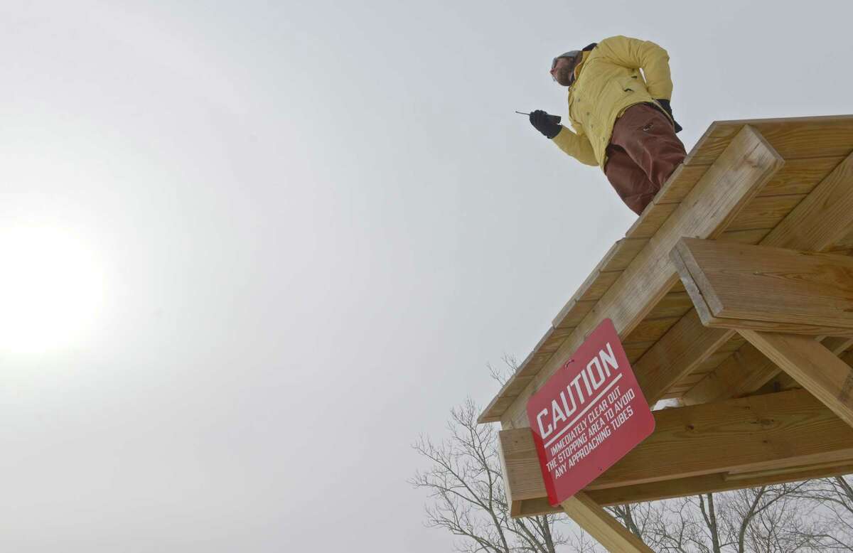Snow tubers enjoy the ride at Woodbury
