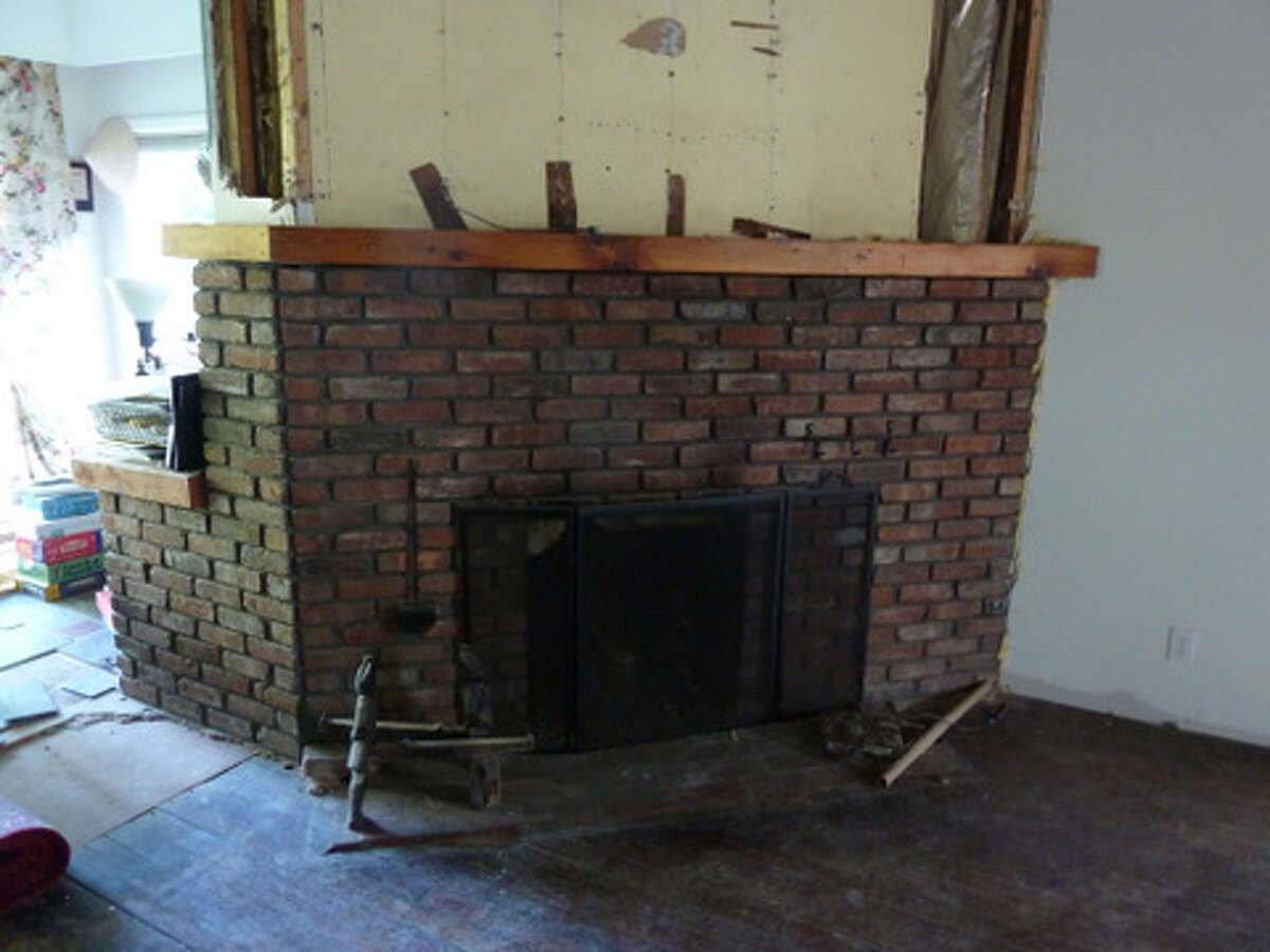 Before - dining room fireplace - a whole lotta brick.