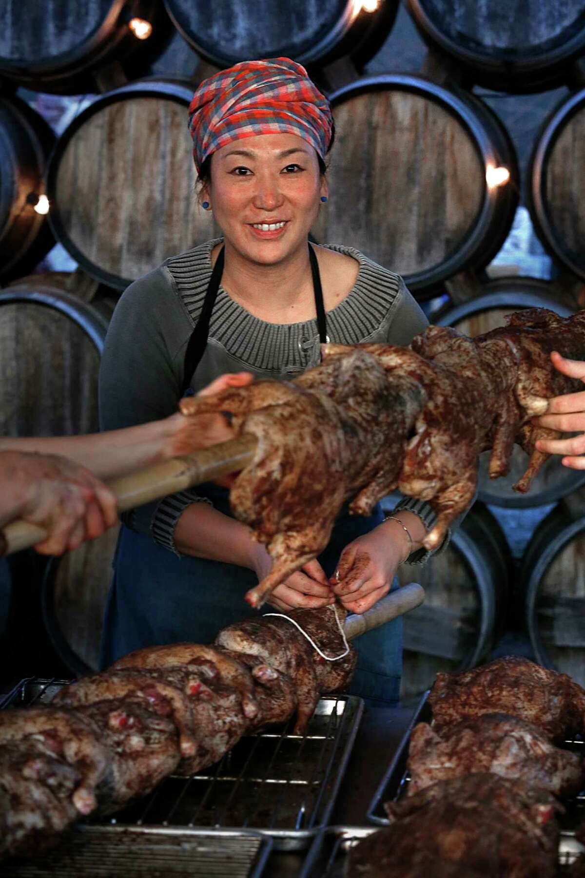 Kyoto chef Masayo Funakoshi prepares duck for a wine club event at Scribe winery in Sonoma.