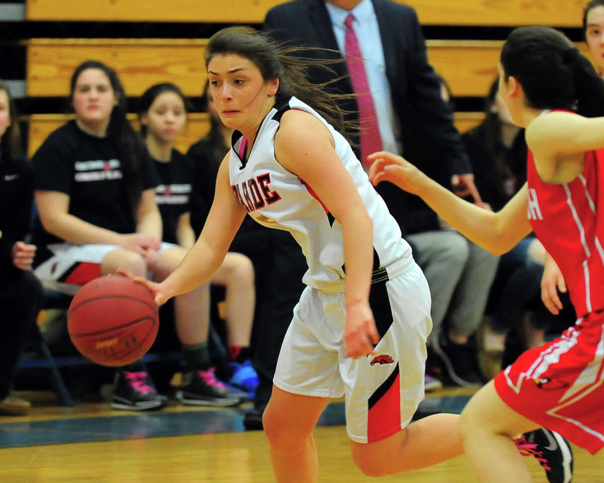 Fairfield Warde's Jacqui Lanese breaks away with the ball after a steal away from Greenwich, during FCIAC Girls' Basketball Semi-finals action in Fairfield, Conn. on Tuesday Feb. 24, 2015.