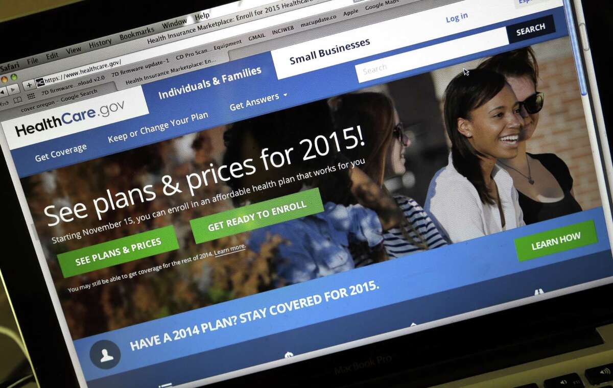 FILE - In this Nov. 12, 2014 file photo, the HealthCare.gov website, where people can buy health insurance, is seen on a laptop screen in Portland, Ore. The share of Americans without health insurance dropped to its lowest level in seven years in 2014 as President Barack Obama's overhaul took full effect, according to an extensive survey released Tuesday. The Gallup-Healthways Well-Being Index found that the trend appears likely to continue this year, since 55 percent of those who remained uninsured told the pollster they plan to get coverage rather than face escalating tax penalties. (AP Photo/Don Ryan, File)