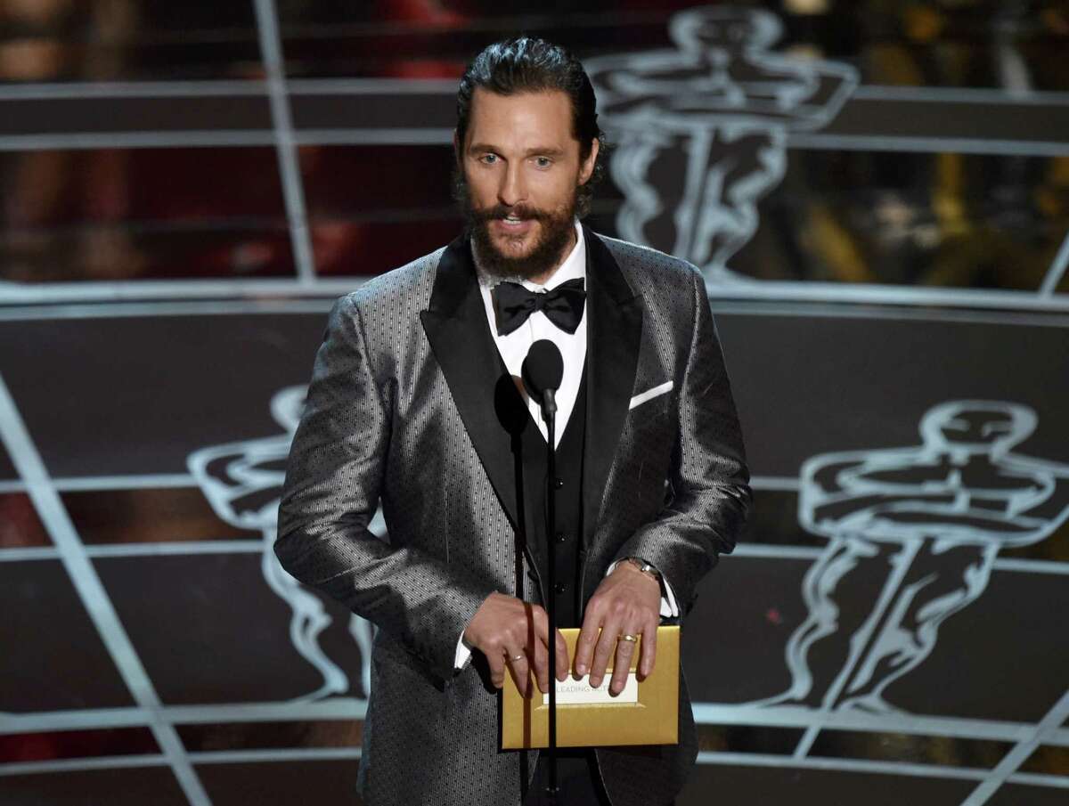 Matthew McConaughey presents the award for best actress in a leading role at the Oscars on Sunday, Feb. 22, 2015, at the Dolby Theatre in Los Angeles. (Photo by John Shearer/Invision/AP)