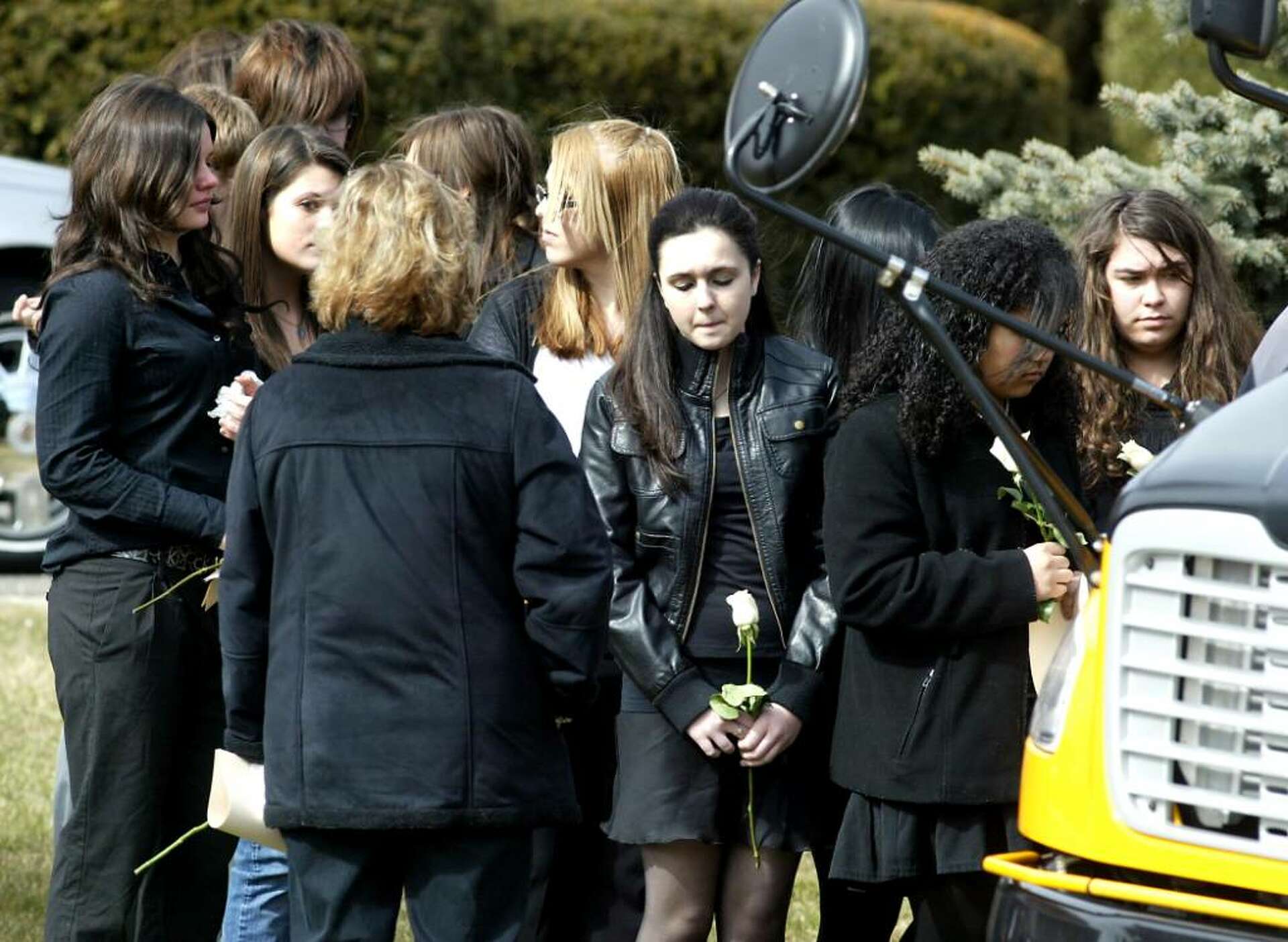 Brother, sister killed in car crash laid to rest