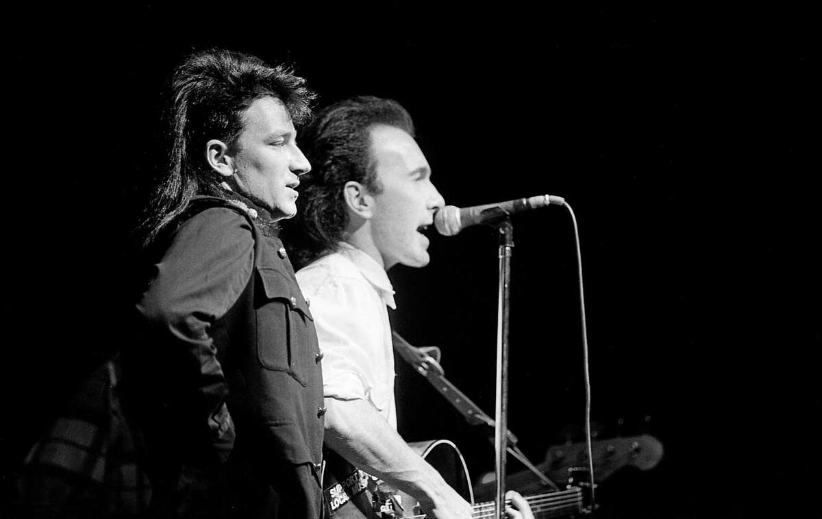 Bono and The Edge in concert with U2 at the Summit, Feb. 27, 1985.