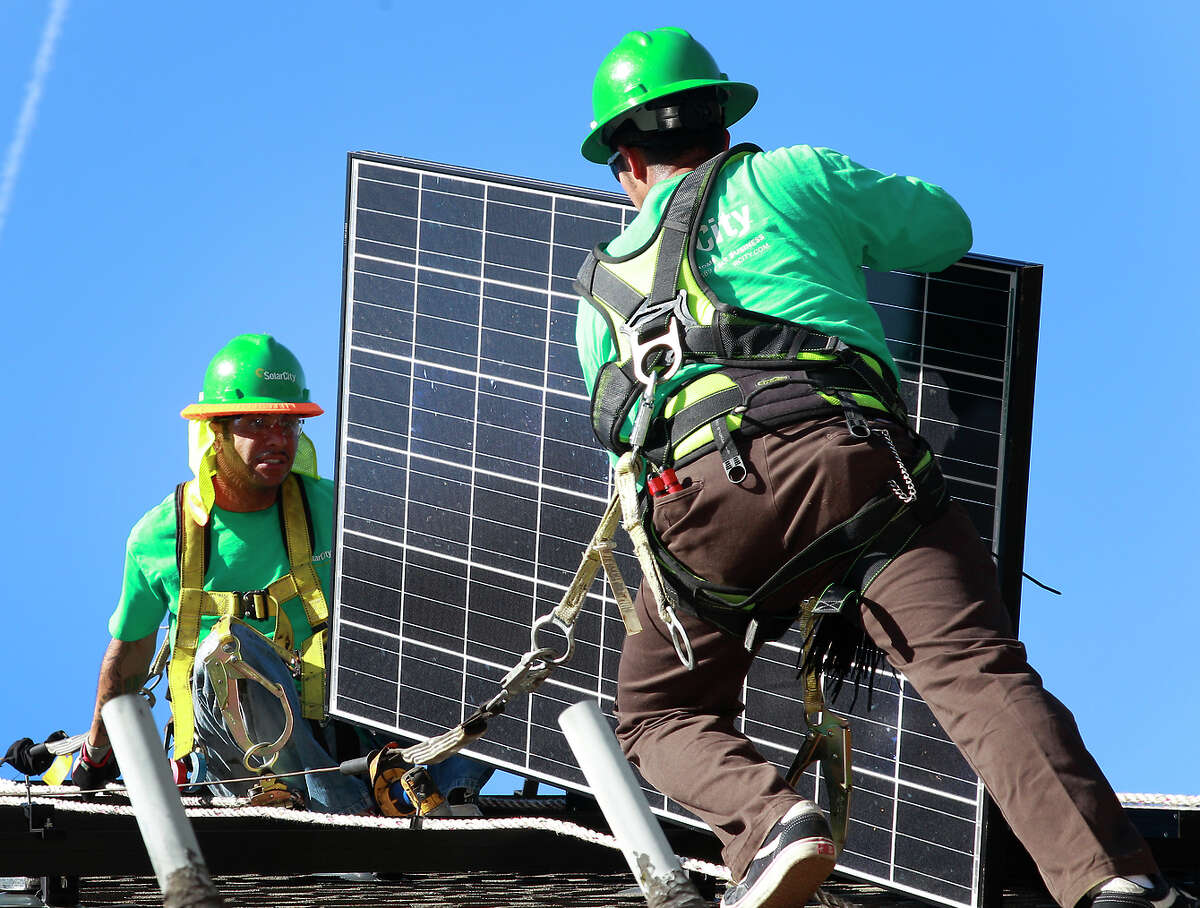 SolarCity says applica tions for its instal lations in the Salt River Project service area have plunged since the utility announced a plan in December to raise the minimum monthly charge for people who generate electricity from solar units.