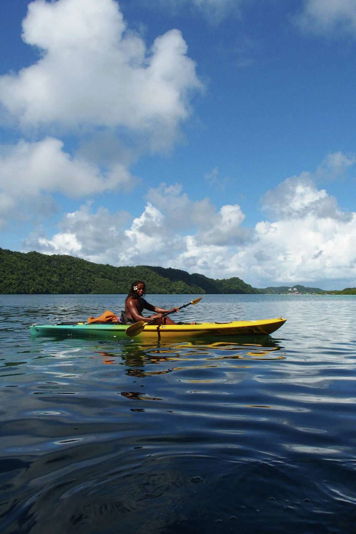 Fonzie, a guide with Sam’s Tours in Koror, takes a moment to enjoy the scenery during a kayak tour of Nikko Bay in the Rock Islands area of Palau.