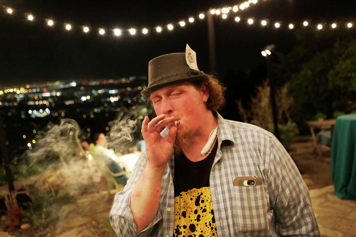 Thomas Edrington of Humboldt County partakes in the “connoisseur-grade” cannabis offered to party-goers.