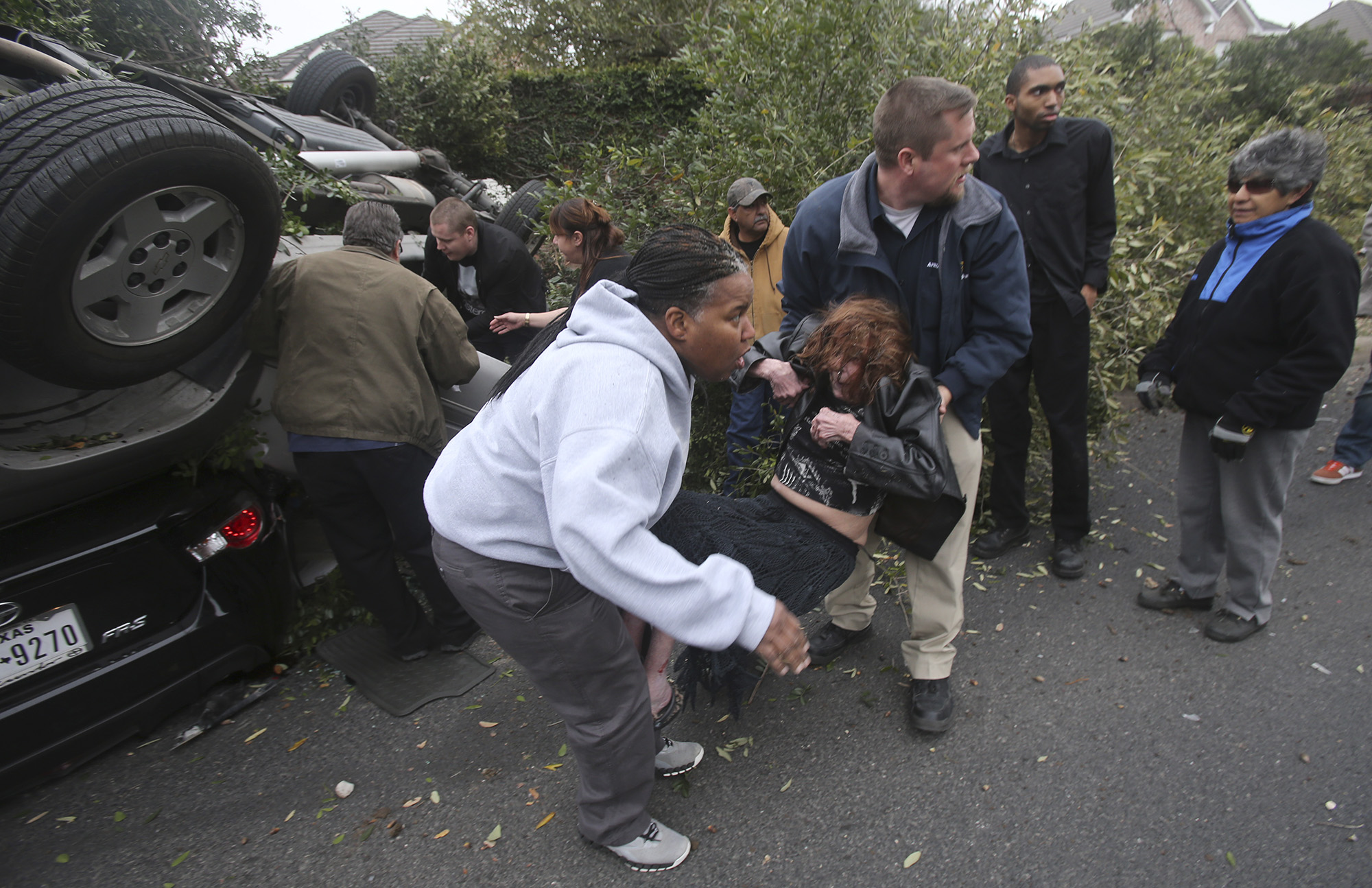 Pedestrians recount rescue of elderly couple trapped in truck