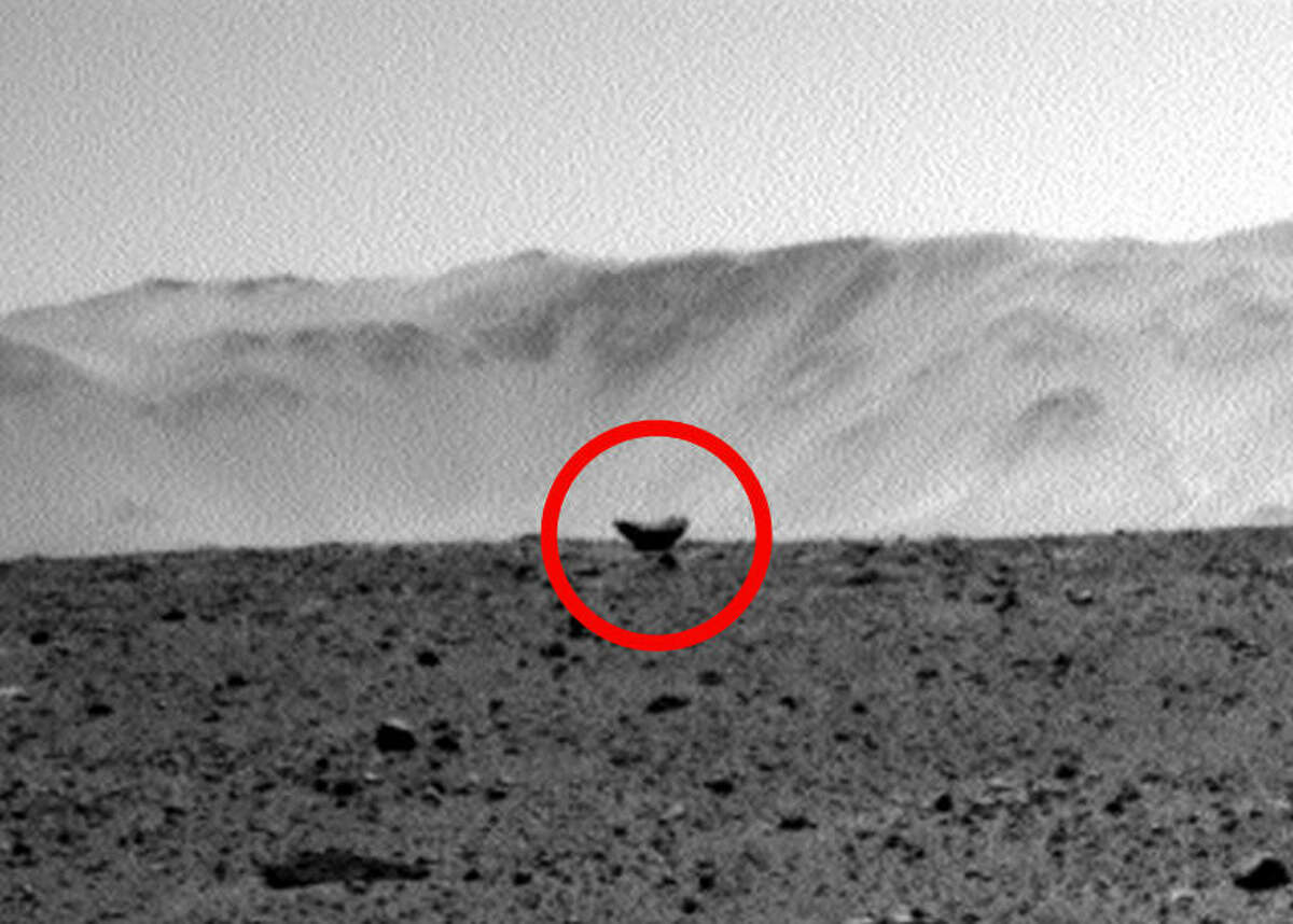 Unusual object on Mars could be crashed UFO, believers claim