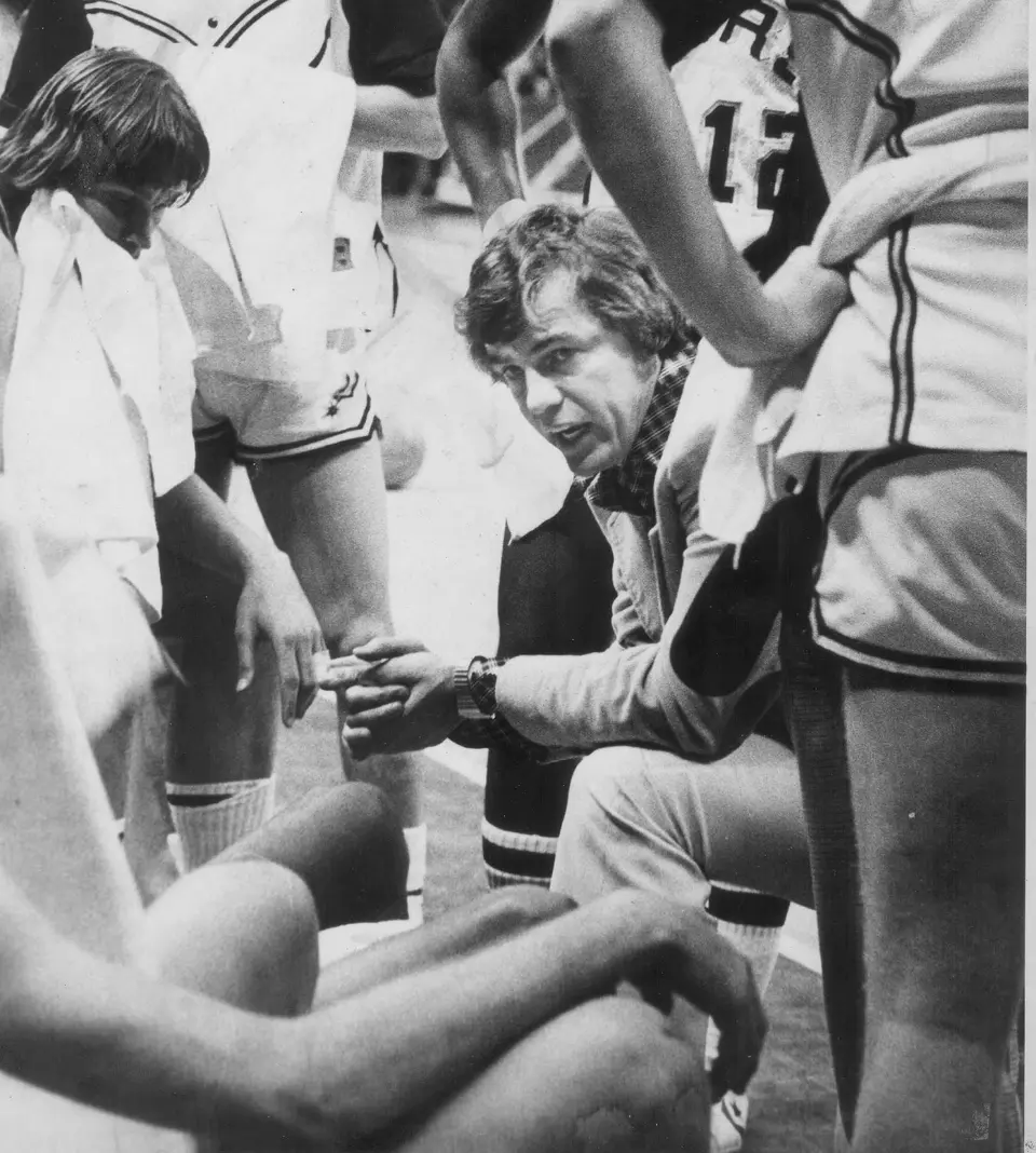 Spurs coach Doug Moe talks to the team in a dubble during a game on May 16, 1979.