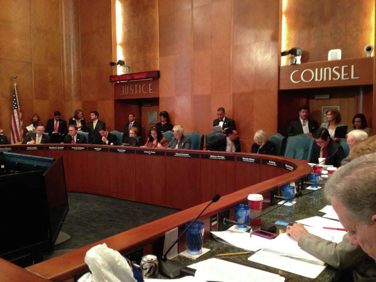 Houston City Council listens to Mayor Annise Parker at a council meeting on Nov. 20, 2013.