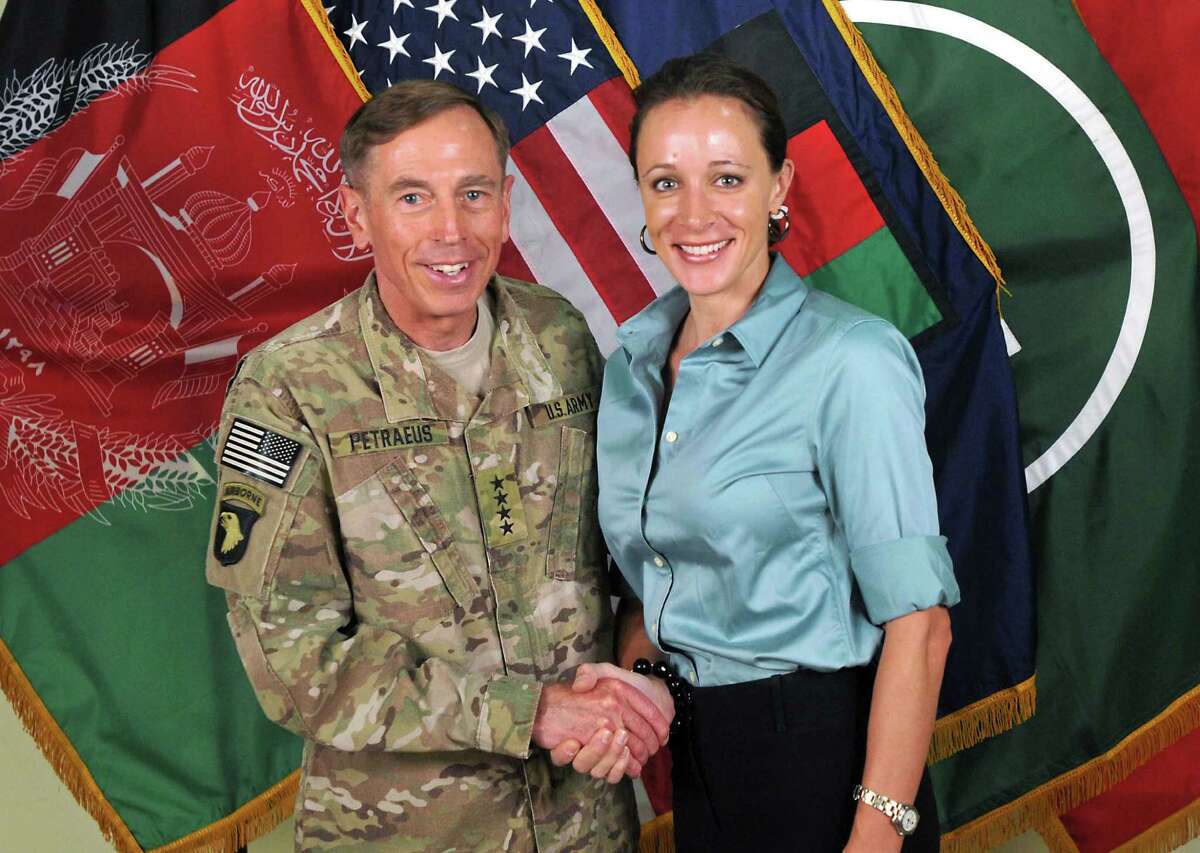In a handout photo, Gen. David Petraeus, then commander of the NATO International Security Assistance Force, with Paula Broadwell, his biographer, in Afghanistan on July 13, 2011. The FBI and Justice Department have recommended felony charges be filed against the now-retired Petraeus for providing classified information to Broadwell, his former mistress, while he was director of the CIA. (International Security Assistance Force NATO via The New York Times) -- EDITORIAL USE ONLY --