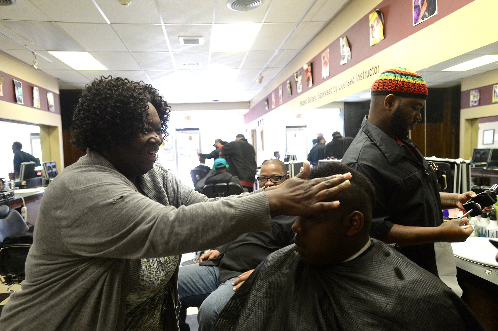 Downtown barber shop teaches the trade