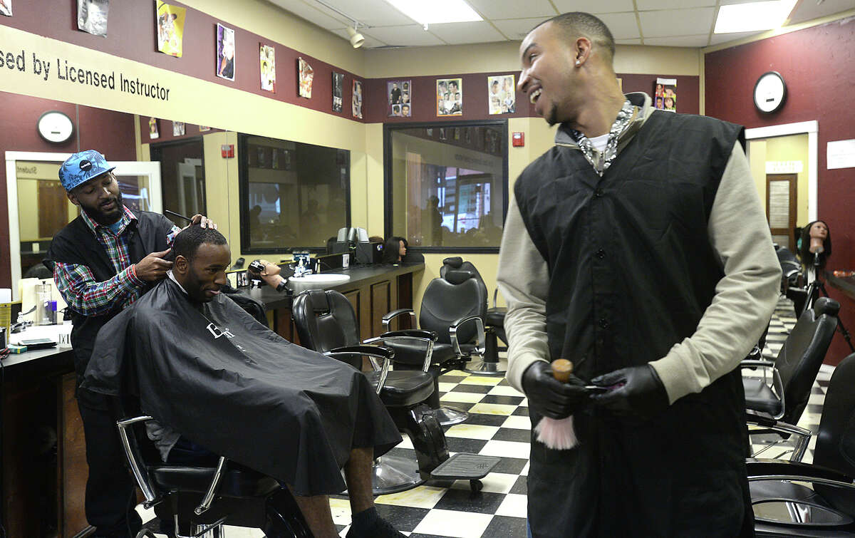 Downtown barber shop teaches the trade