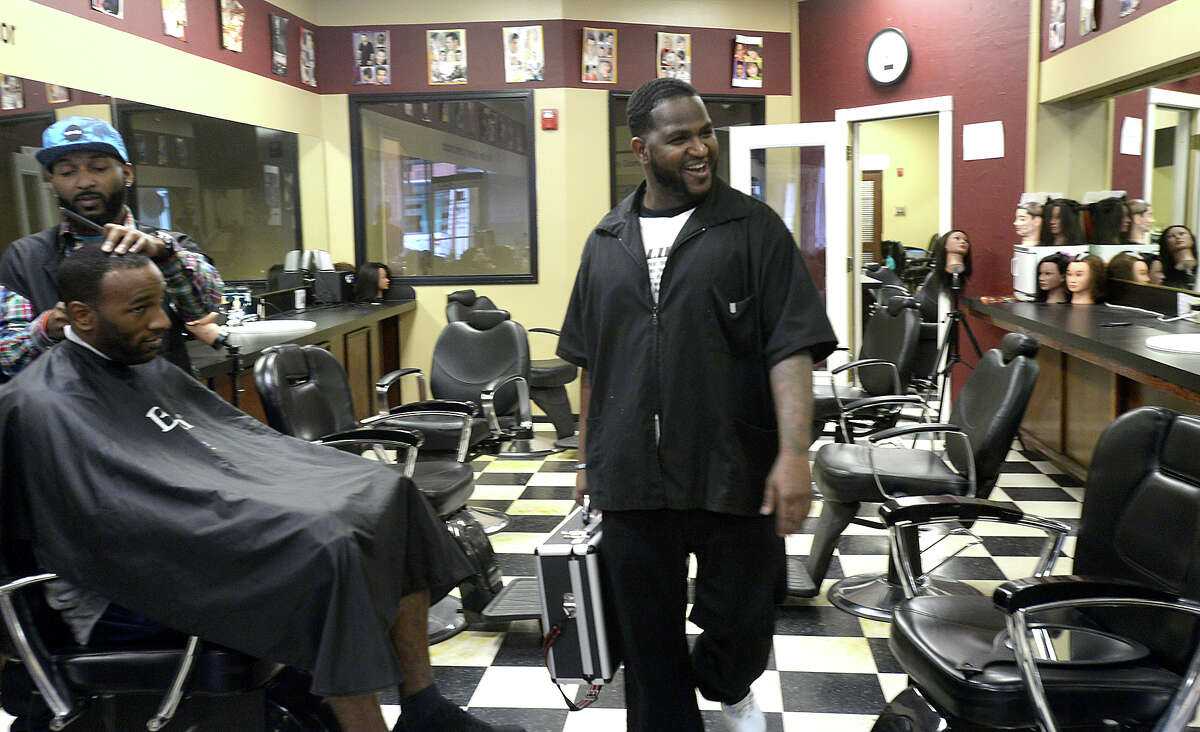 Downtown barber shop teaches the trade