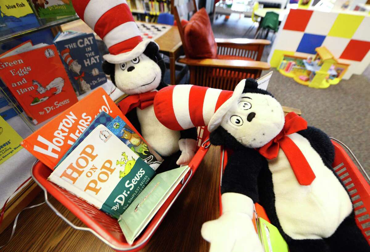 Dr. Seuss books are assembled in baskets for children to read Monday afternoon, March 2, 2015, at William K. Sanford Town Library in Colonie, N.Y. To mark Read across America Day, the Town Library held special Dr. Seuss birthday activities. They offered games and prizes, with a therapy session dog held from 4 till 5 p.m. The National Education Association sponsors the day each year. Theodor Seuss Geisel -- Dr. Seuss -- was born March 2, 1904. He published 46 children?’s books, often characterized by imaginative characters and rhymes. (Will Waldron/Times Union)