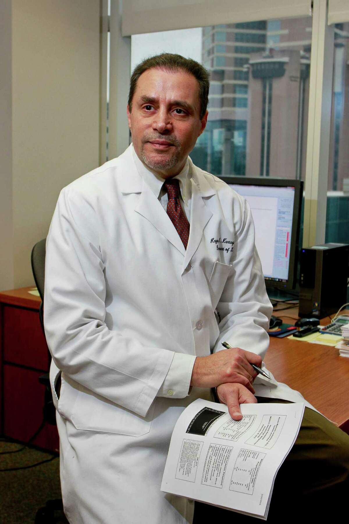 Dr. Hagop Kantarjian, chairman of MD Anderson Cancer Center's leukemia department, is planning a grassroots campaign on social media to collect the stories and signatures of 1 million cancer patients and survivors affected by exorbitant drug prices. (For the Chronicle/Gary Fountain, February 16, 2015)
