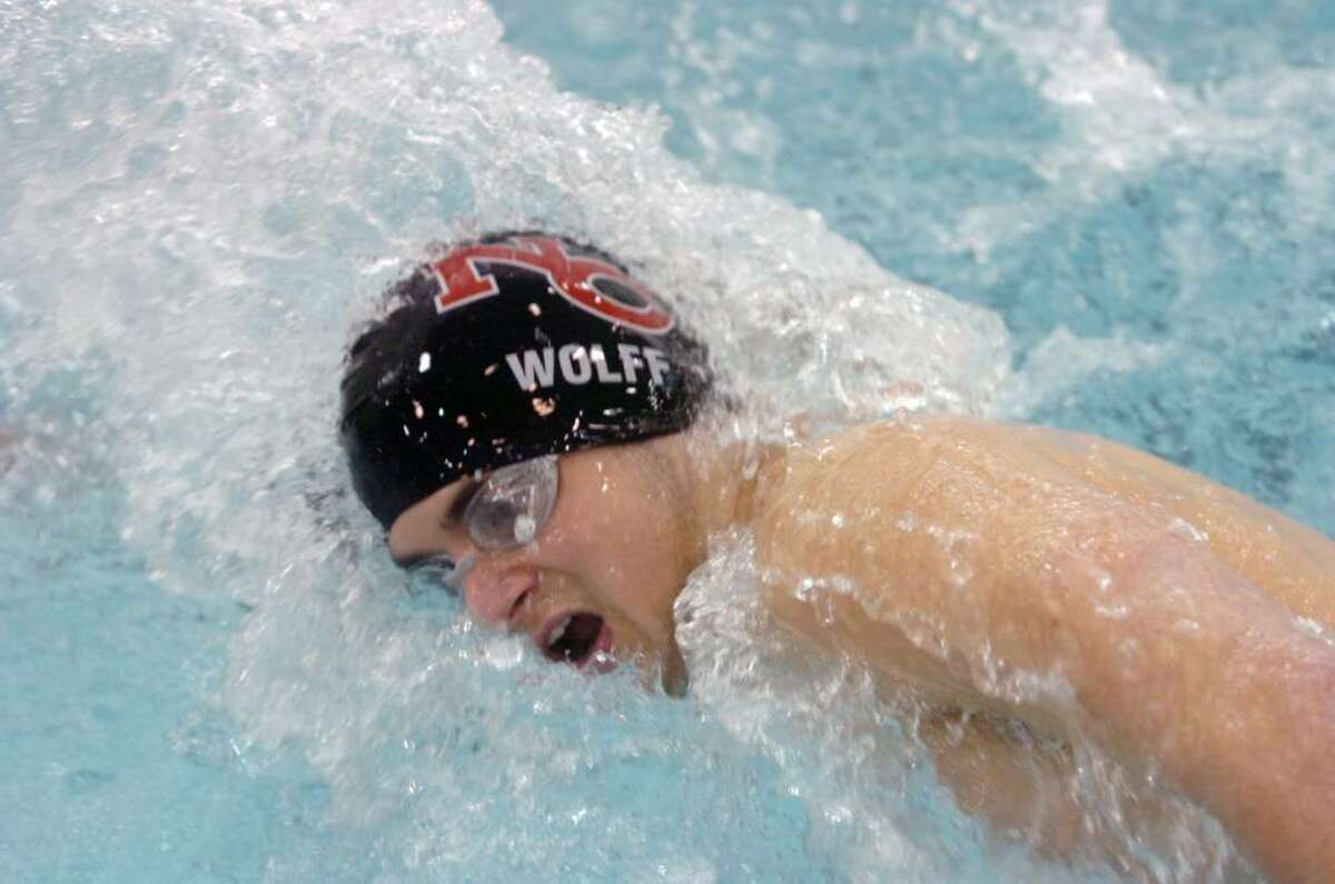 New Canaan's Austin Wolff swims the 200 free as Greenwich High School host the 2010 FCIAC Boys Swimming Championship Thursday evening, March 4, 2010.