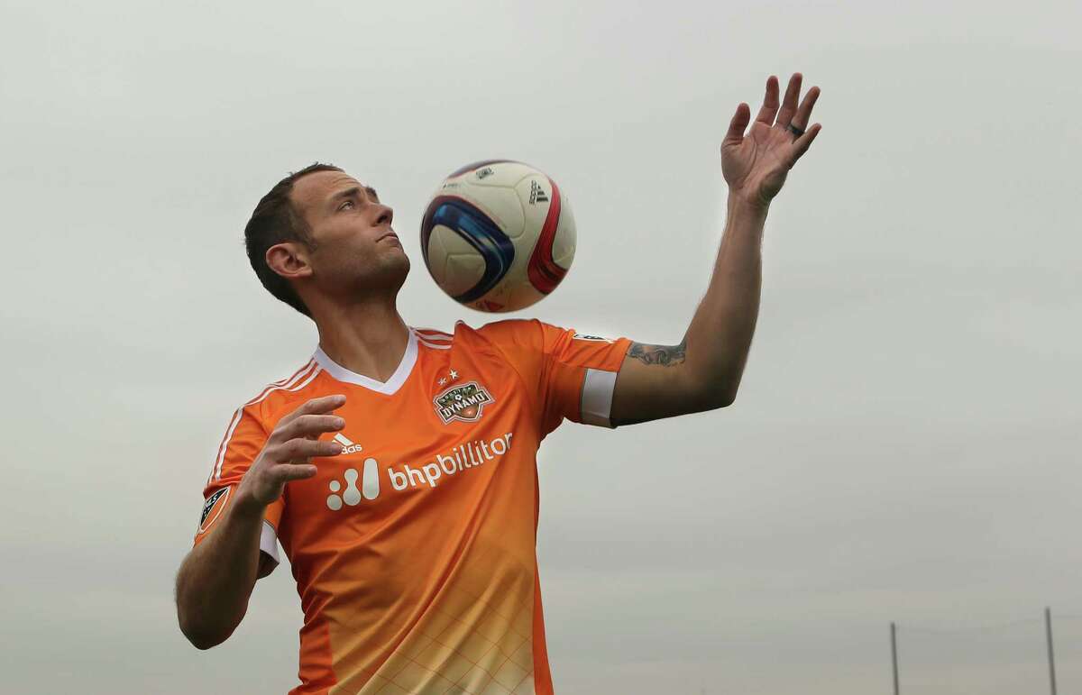 The Houston Dynamo reveal their new jerseys with captain Brad Davis at Houston Sports Park on Monday, March 2, 2015, in Houston.