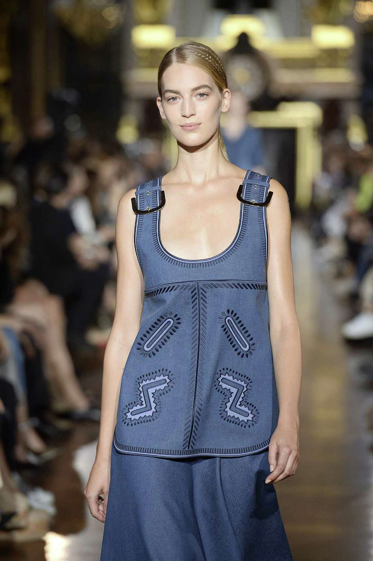 Demin will be a hot fabric this spring on a variety of garments from tunics to skirts to shorts as seen in this look from Stella McCartney.