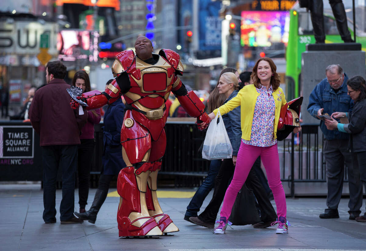 Ellie Kemper has the title role as a “mole woman” in a cult that thought the world ended 15 years ago, with Tituss Burgess as her roommate in New York, in “Unbreakable Kimmy Schmidt.”