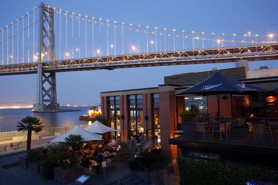 Woman Rescued From Rocks Along San Francisco S Embarcadero Sfgate File The Waterbar At Dusk With Bay Bridge In Background San