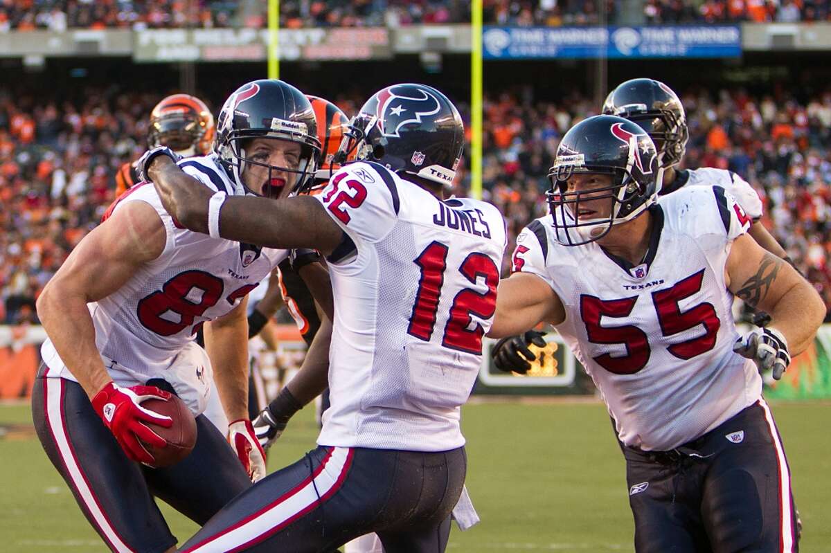 Texans wide receiver Kevin Walter (left) celebrates with wide receiver Jacoby Jones and center Chris Myers (55) after his touchdown catch to beat the Bengals in 2011 and clinch the team's first AFC South title.