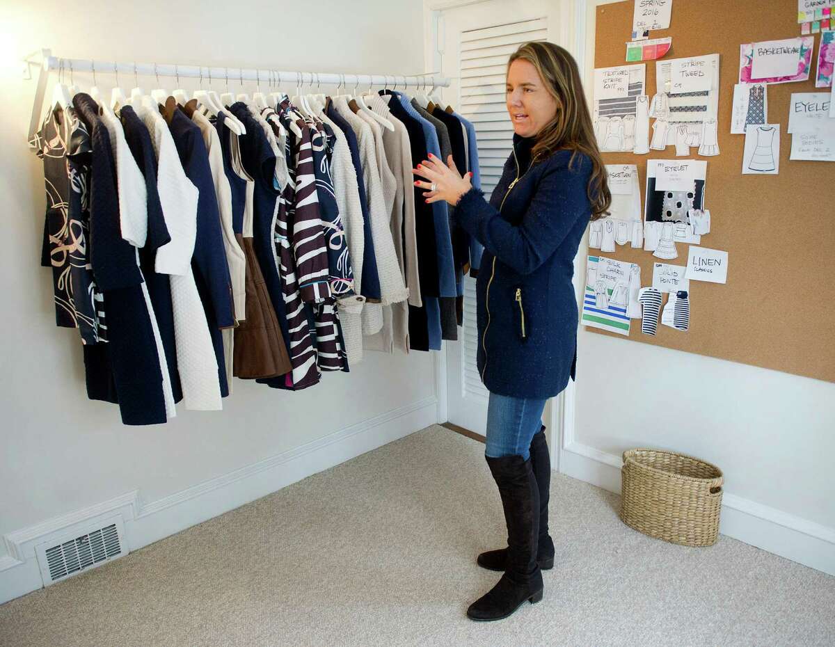 Jennifer Stocker, owner of Sail to Sable, shows off pieces from the fashion line at her home in Darien, Conn., on Wednesday, March 4, 2015.