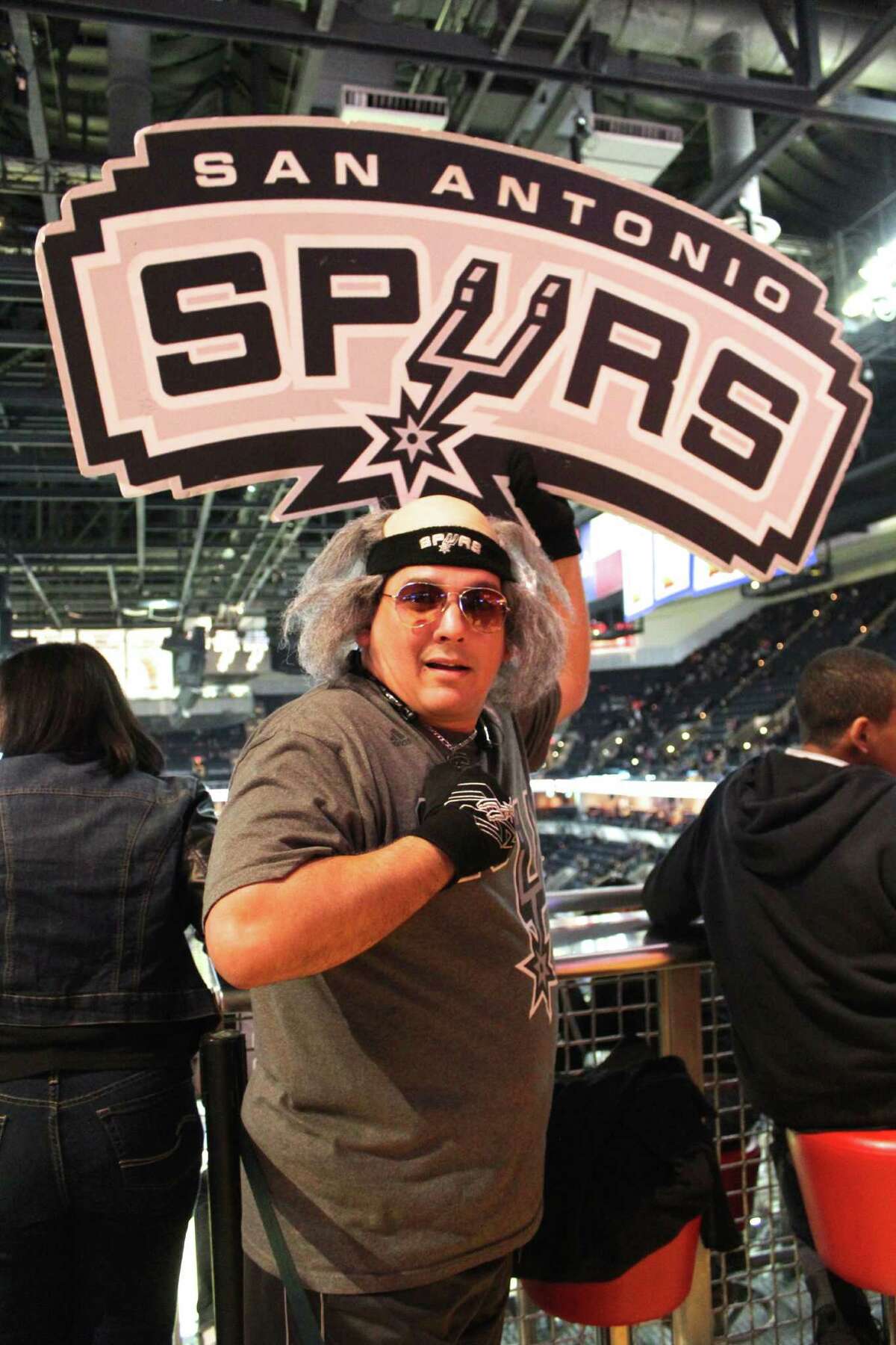 mySpy spotted these Spurs fans at the Spurs vs. Kings game on March 4, 2015.