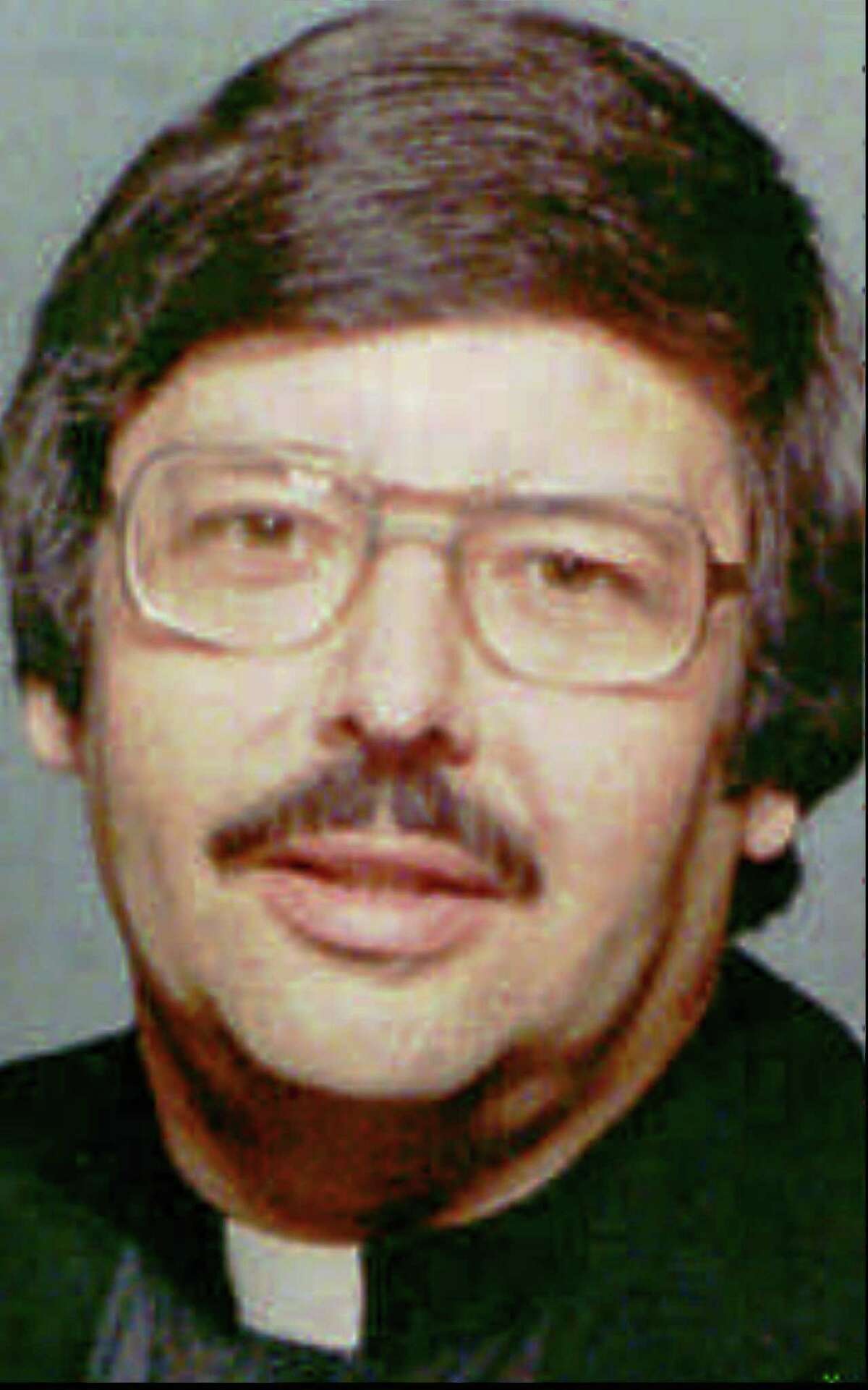 An undated file photo of the Rev. Raymond Pcolka whose last assignment was as pastor of the Sacred Heart parish in the Byram section of Greenwhich, Conn. In January 1993, 15 men and women filed civil lawsuits accusing Pcolka of sexually assaulting them when they were youngsters while he was an assistant pastor in Bridgeport and Stratford.