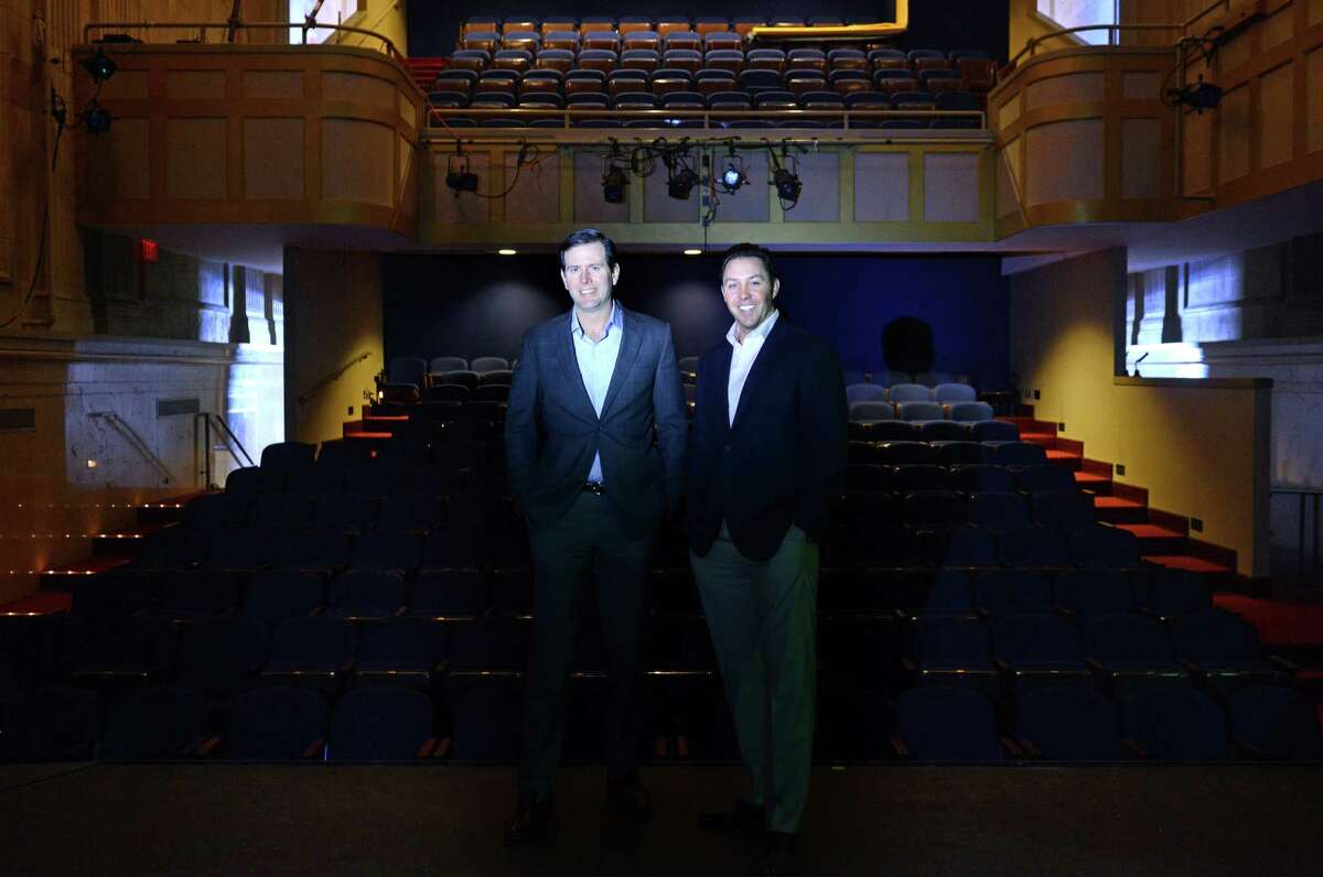 Brett Wilderman, left, and Brandon Hall, principals at Forstone Capital, stand in the former Playhouse on the Green on State Street in downtown Bridgeport. They have plans for a number of new developments around McLevy Green, including the old theater which will become a comedy club.