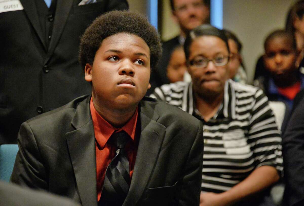 Brighter Choice Boys Middle School graduate, now an Albany High freshman, Chris Jackson waits his turn to address the State University of New York Charter Schools Committee during a meeting Friday March 6, 20125 in Albany, NY. (John Carl D'Annibale / Times Union)