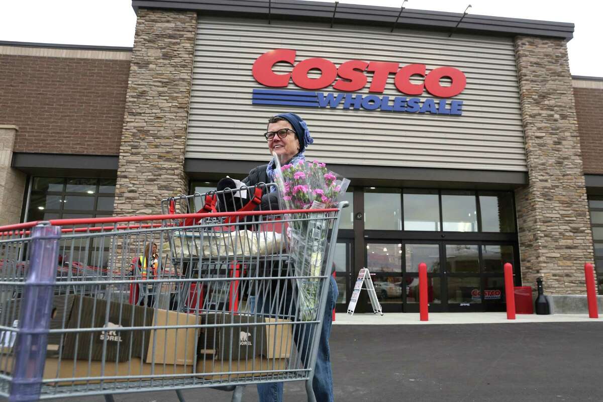 Linda Bultema leaves the Costco store in Kalamazoo, Mich. Costco has struck a deal for Citi to be the exclusive issuer of its co-branded credit cards, with Visa replacing American Express as the card network.