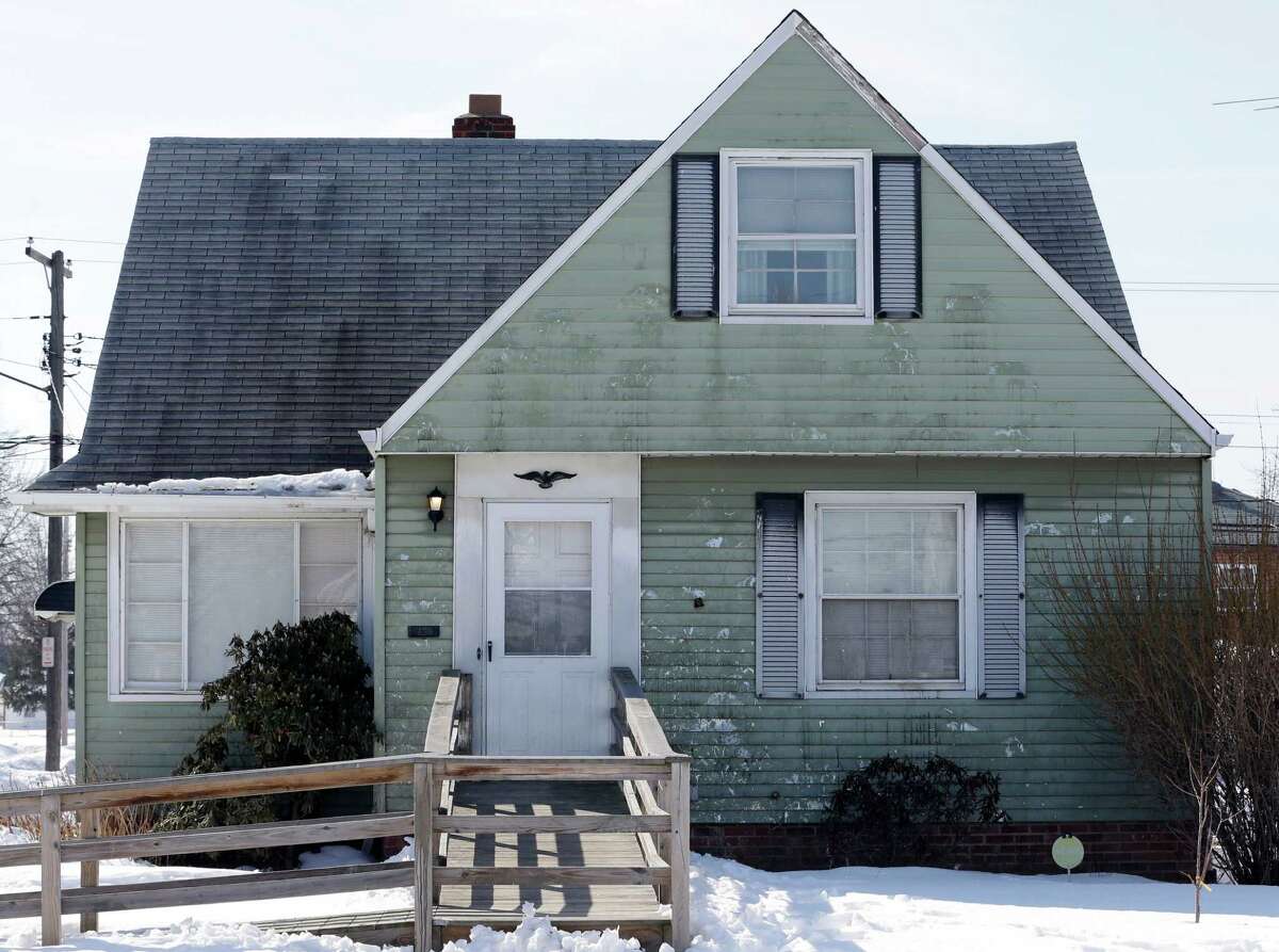 A home that has been pelted with eggs several times a week for a year is shown Friday, March 6, 2015, in Euclid, Ohio. Police haven't been able to crack the unusual case despite doing stakeouts, questioning neighbors, installing a surveillance camera and even testing eggshells as evidence. (AP Photo/Tony Dejak)