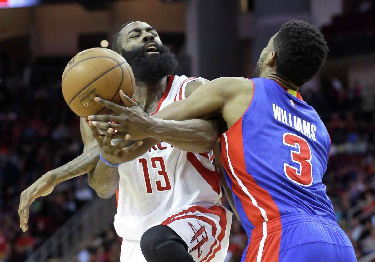 It's crunch time in the NBA. As the Rockets make their playoff push, James Harden, left, feels the brunt of the Pistons' defensive tactics, courtesy of Shawne Williams. Harden shook it off to post a triple-double - 38 points, 12 rebounds, 12 assists.