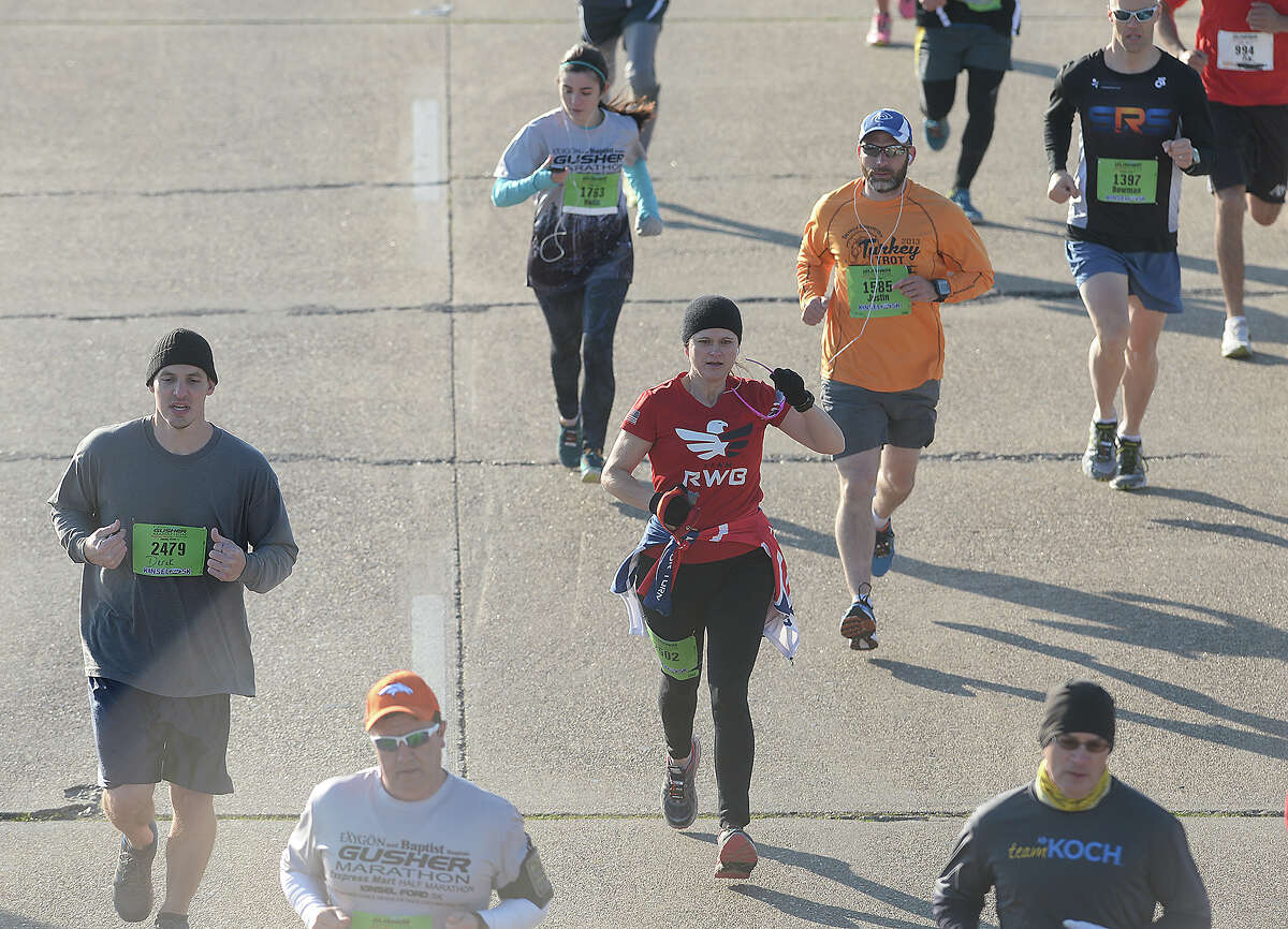 5K runners set out during the sixth annual Exygon and Baptist Hospitals Gusher Marathon Saturday in Beaumont. Photo taken Saturday, March 7, 2015 Kim Brent/The Enterprise